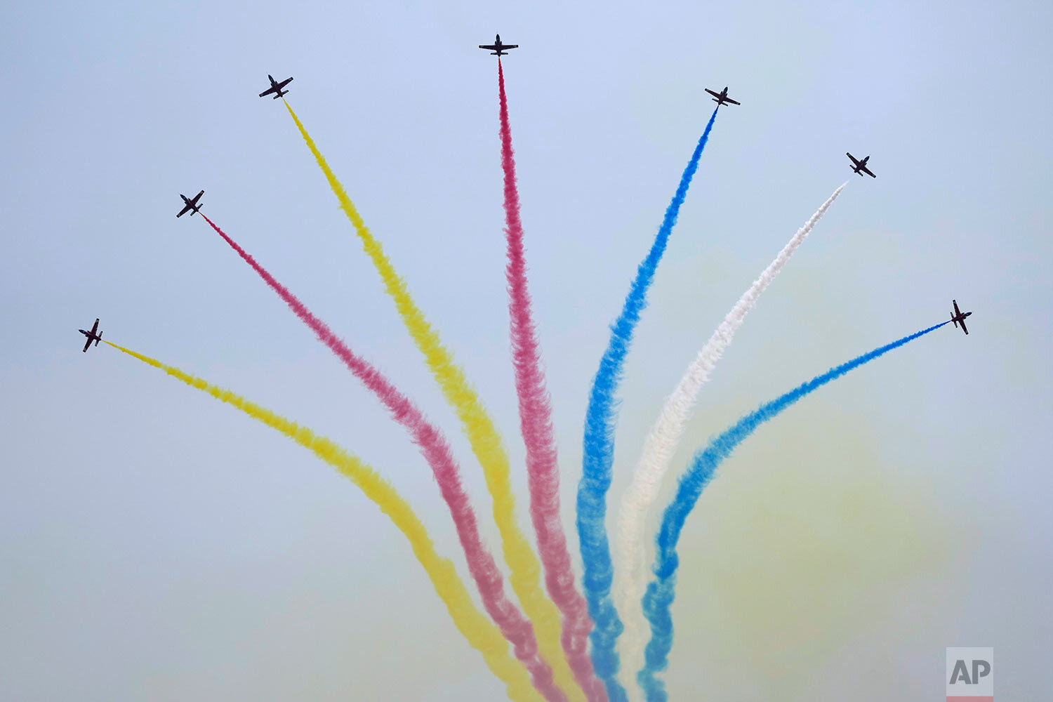  Members of the Chinese People's Liberation Army (PLA) Air Force Aviation University's "Red Falcon" Air Demonstration Team perform during the 13th China International Aviation and Aerospace Exhibition, also known as Airshow China 2021, on Tuesday, Se