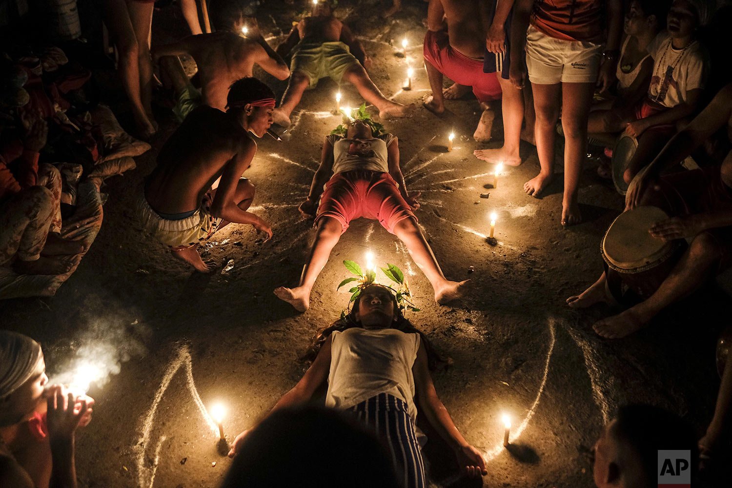 Followers of Maria Lionza's cult practice a ritual at Sorte Mountain in Venezuela's Yaracuy state, early Oct. 12, 2021, one year after the annual pilgrimage was cancelled due to COVID-19 restrictions. Along with Santeria, Venezuela is home to other 