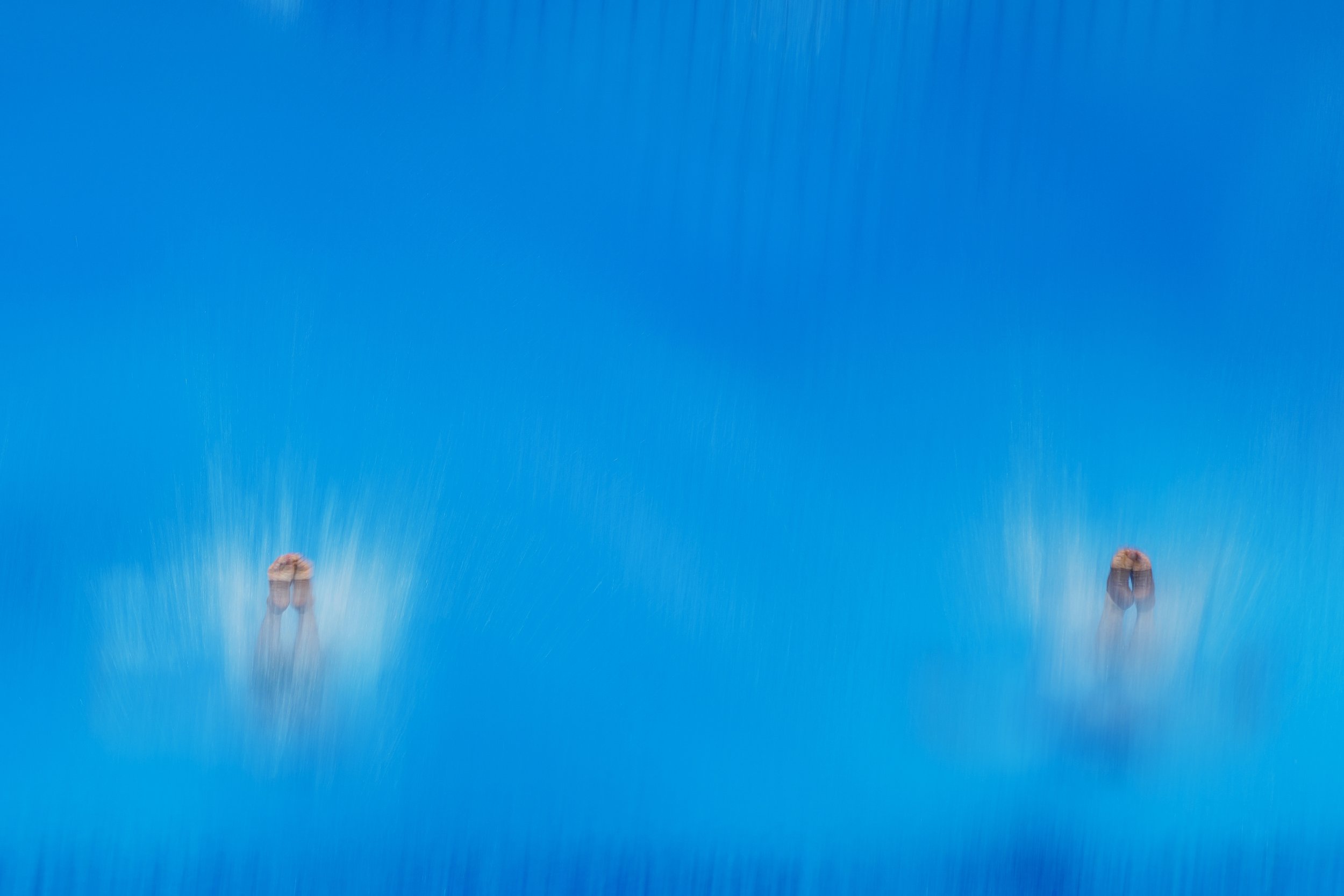  China's Wang Zongyuan and Xie Siyi compete during synchronized 3-meter springboard at the 2020 Summer Olympics in Tokyo, Japan, on July 26, 2021. (AP Photo/Morry Gash) 