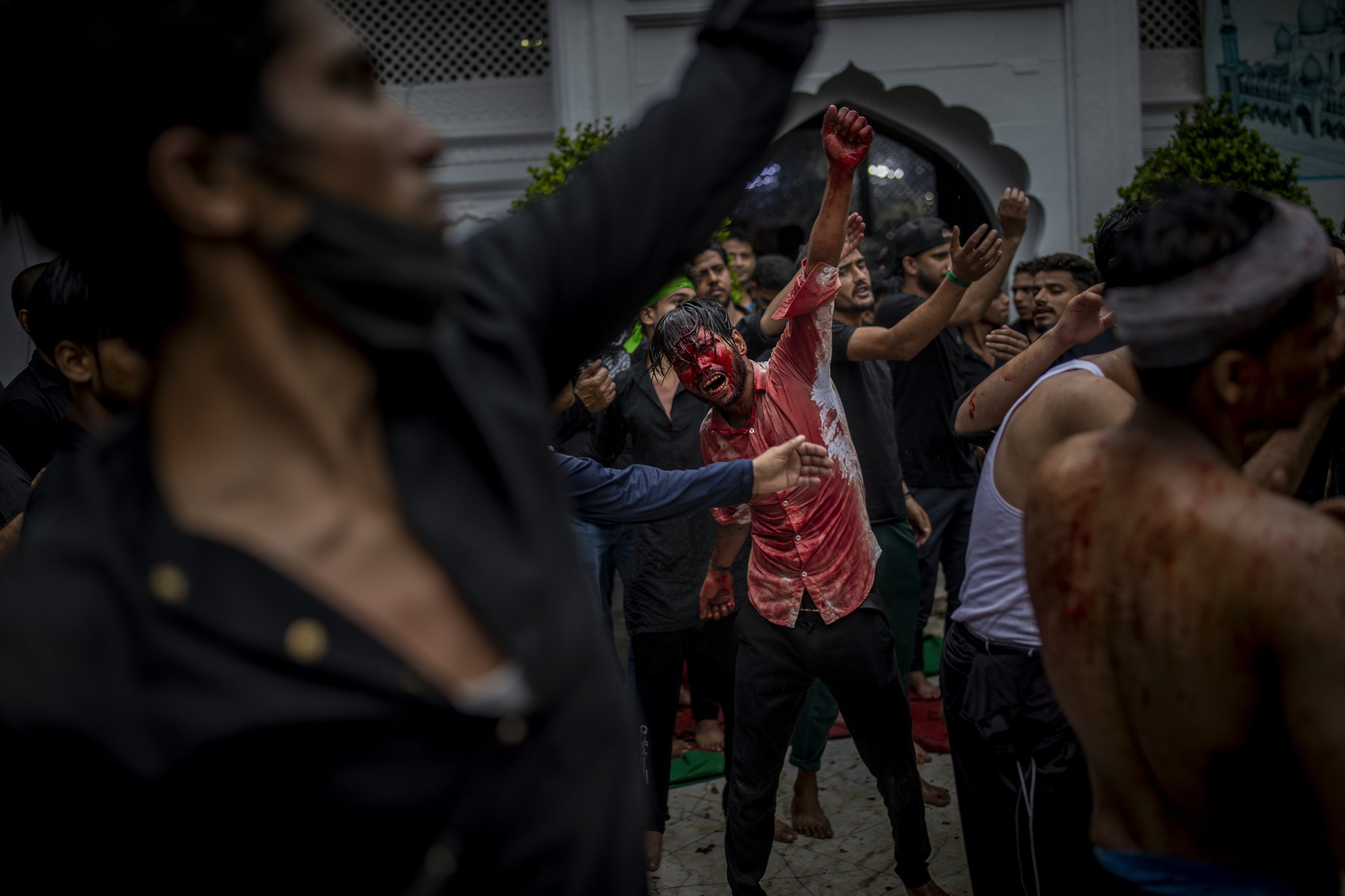  Shiite Muslims flagellate themselves during a procession to mark Ashoura in New Delhi, India, on Aug. 20, 2021. (AP Photo/Altaf Qadri) 