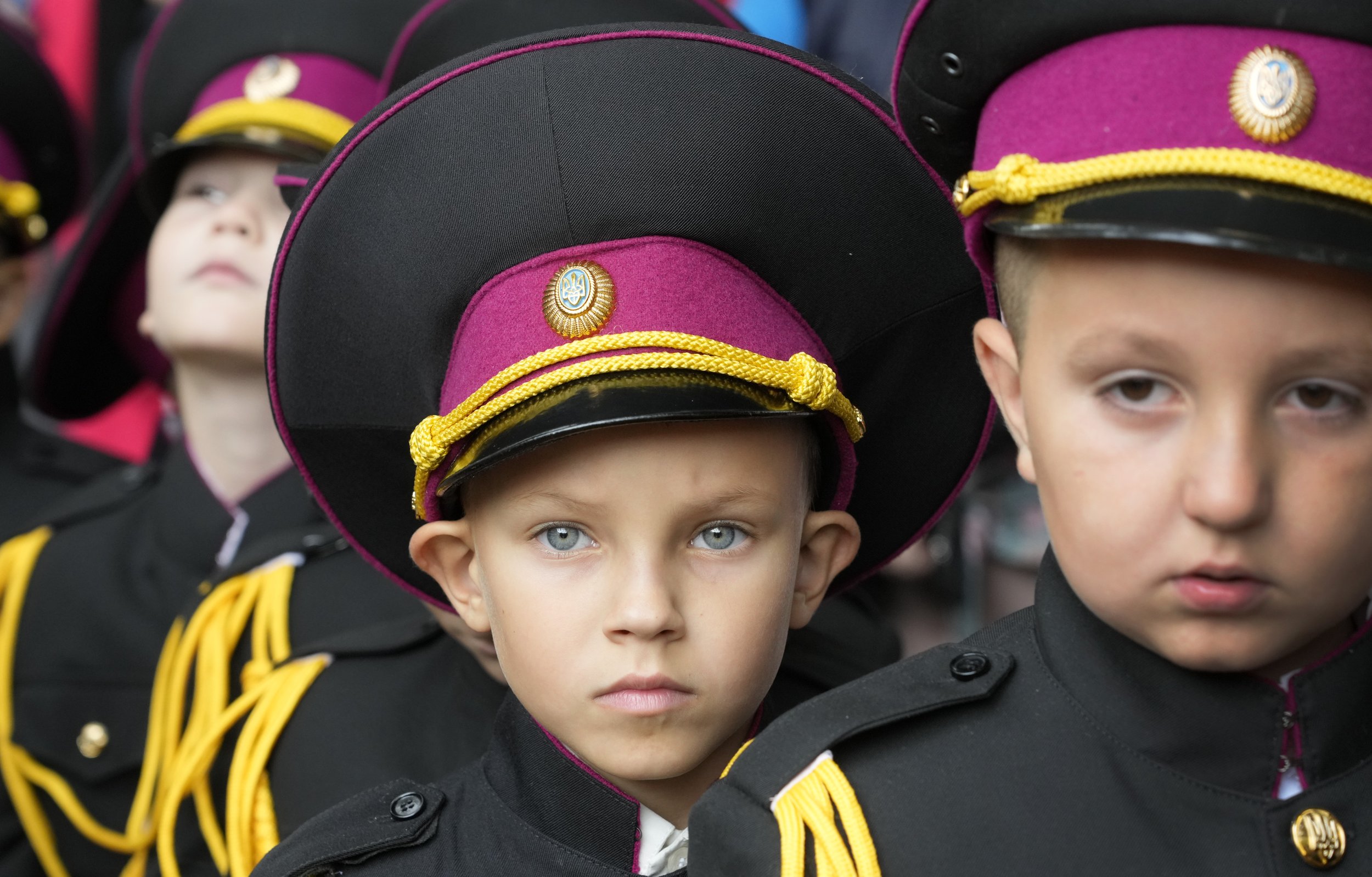  Young cadets attend a ceremony on the first day of school at a cadet lyceum in Kyiv, Ukraine, on Sept. 1, 2021. Ukraine marks Sept. 1 as Knowledge Day, the traditional launch of the academic year. (AP Photo/Efrem Lukatsky) 