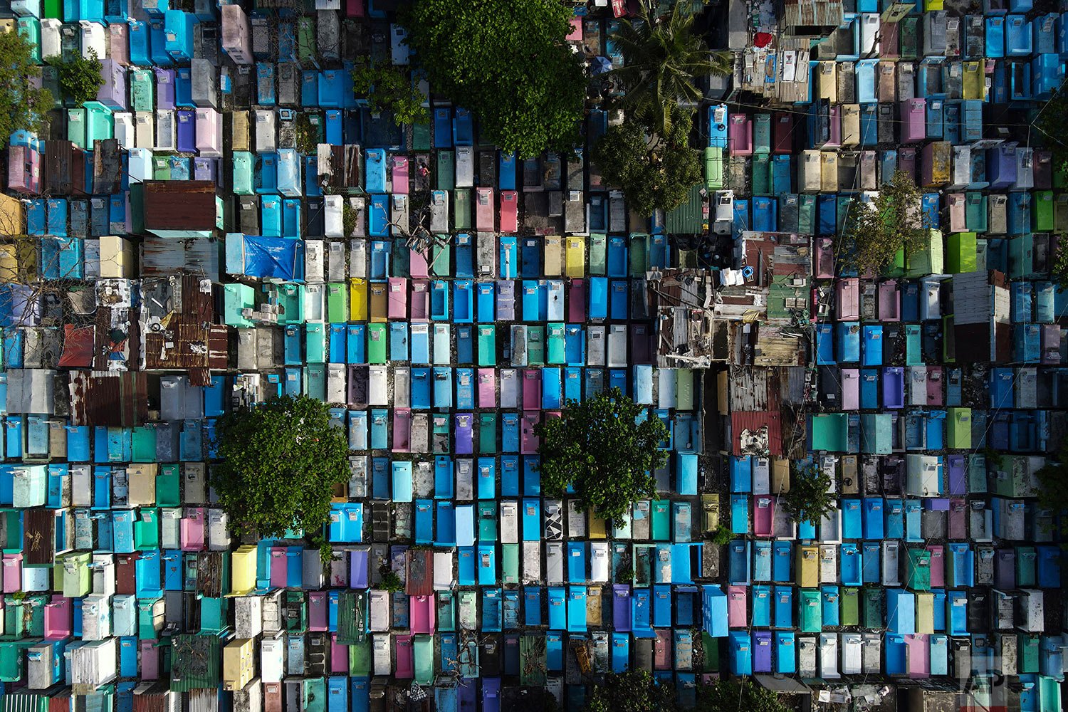  Rows of tombs remain without the usual visitors on All Saint's Day at Manila's North Cemetery, Philippines on Monday, Nov. 1, 2021. (AP Photo/Aaron Favila) 