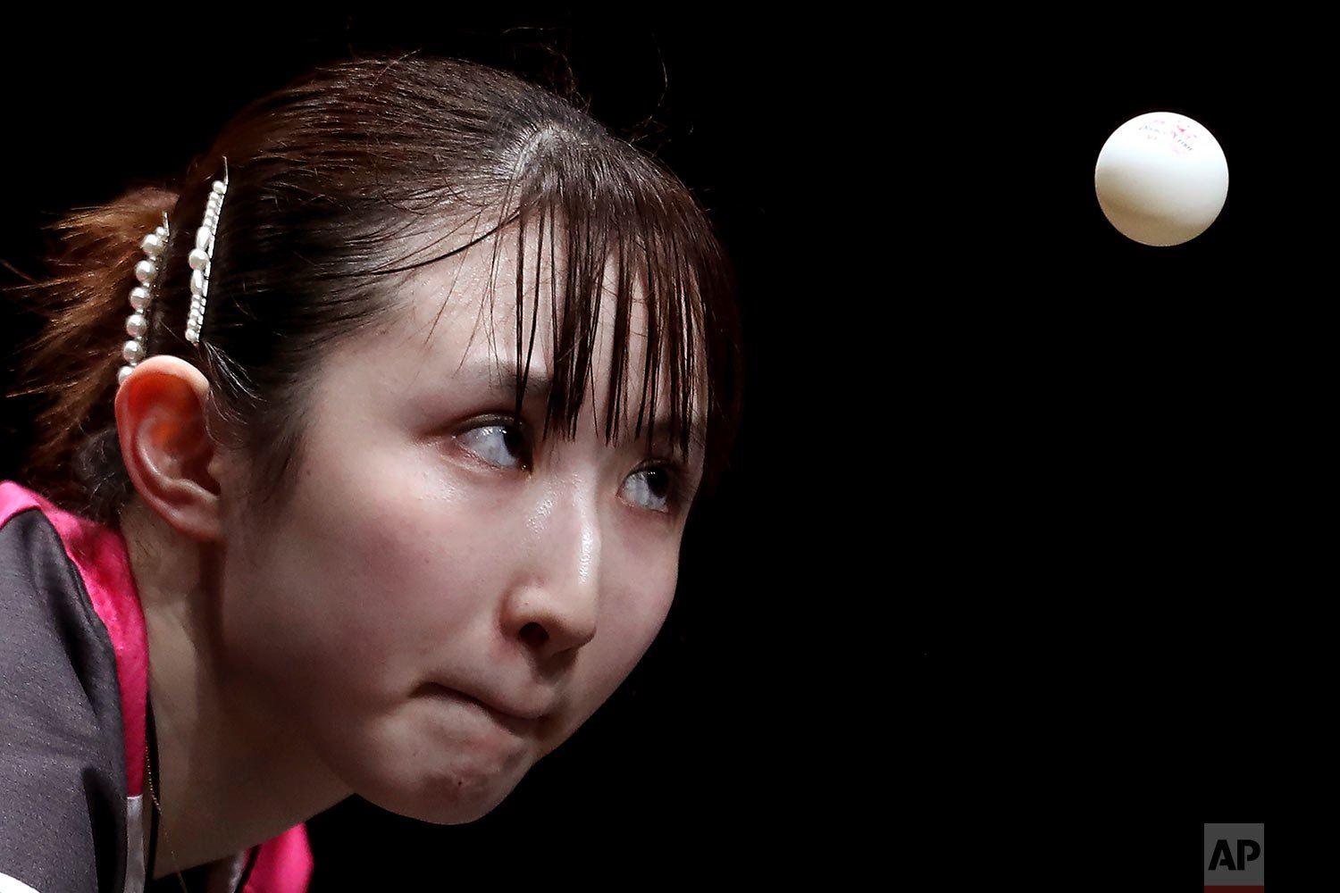  Japan's Hina Hayata serves to Taiwan's Cheng I-Cheng during their round of 16 match in the World Table Tennis Cup Finals in Singapore, Sunday, Dec. 5, 2021. (AP Photo/Paul Miller) 