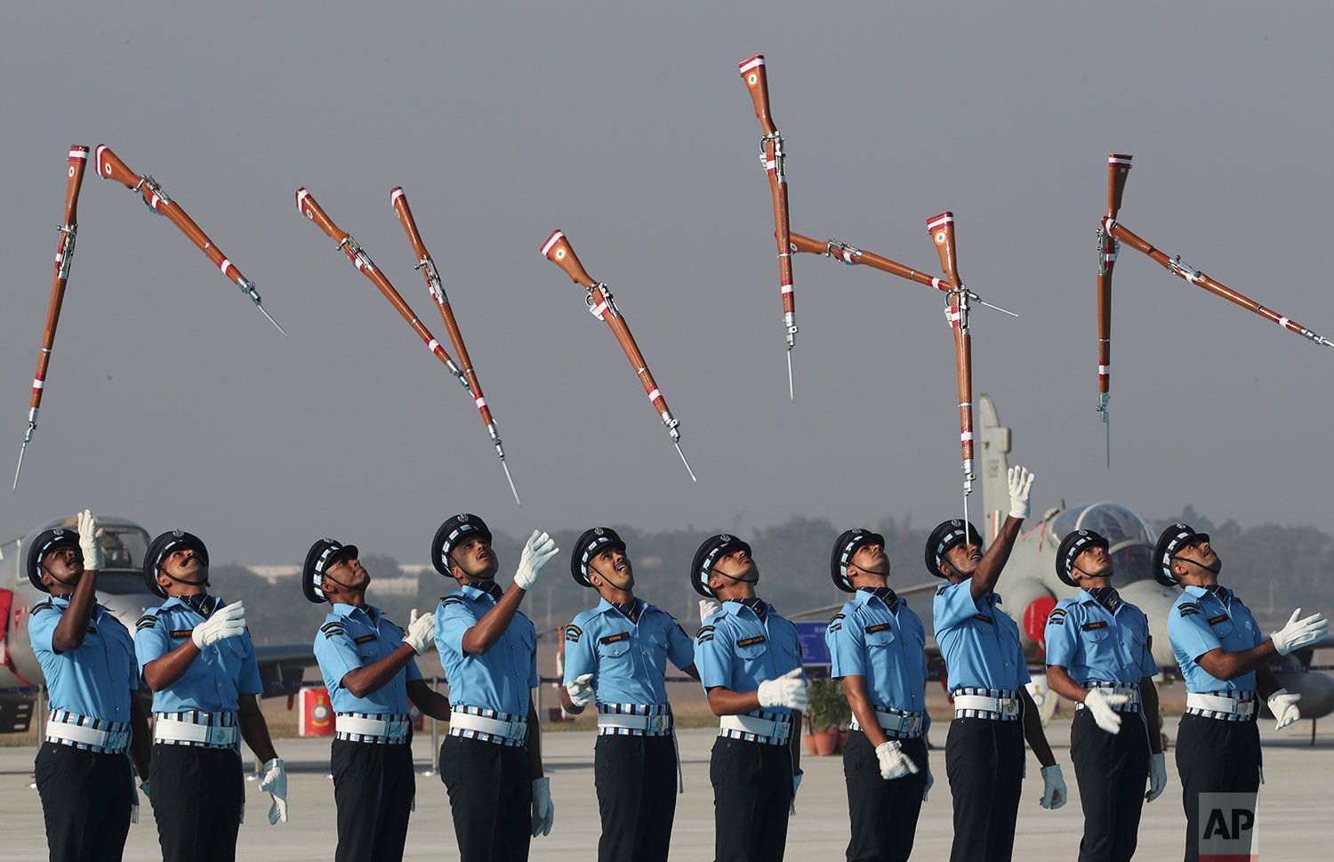  An Indian Air Force Air Warrior drill team displays rifle handling skills during a graduation ceremony of new cadets at the Air Force Academy in Dundigal, on the outskirts of Hyderabad, India, Saturday, Dec. 18, 2021. (AP Photo/Mahesh Kumar A.) 