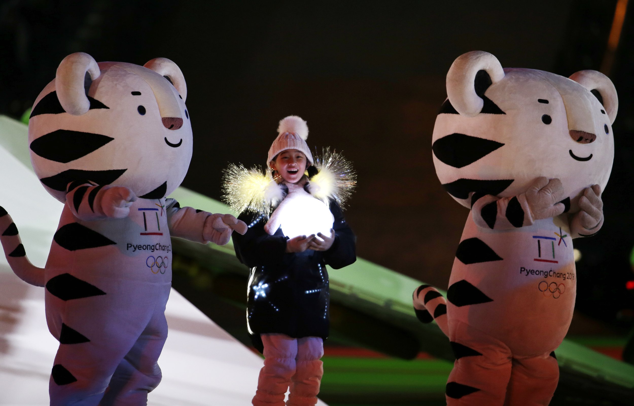  Olympic mascots and a young girl participate in the closing ceremony of the 2018 Winter Olympics in Pyeongchang, South Korea, Feb. 25, 2018. (AP Photo/Natacha Pisarenko) 