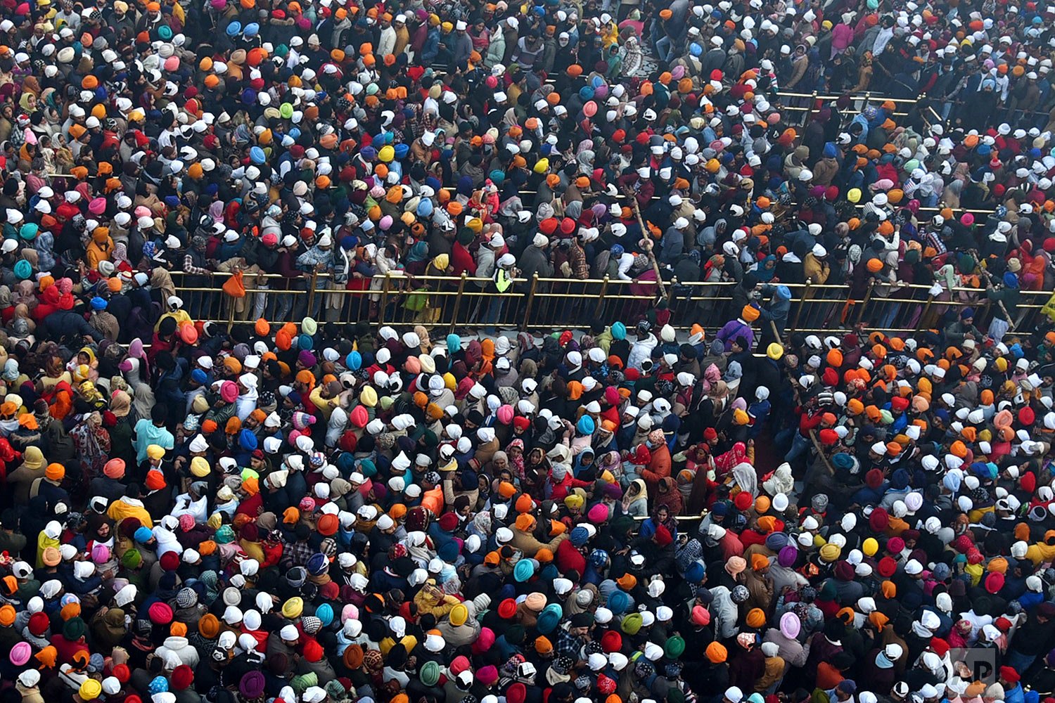  Sikh devotees gather to pay obeisance at the Golden Temple, the holiest of Sikh shrines, on New Year's Day in Amritsar, India, Saturday, Jan. 1, 2022. (AP Photo/Prabhjot Gill) 