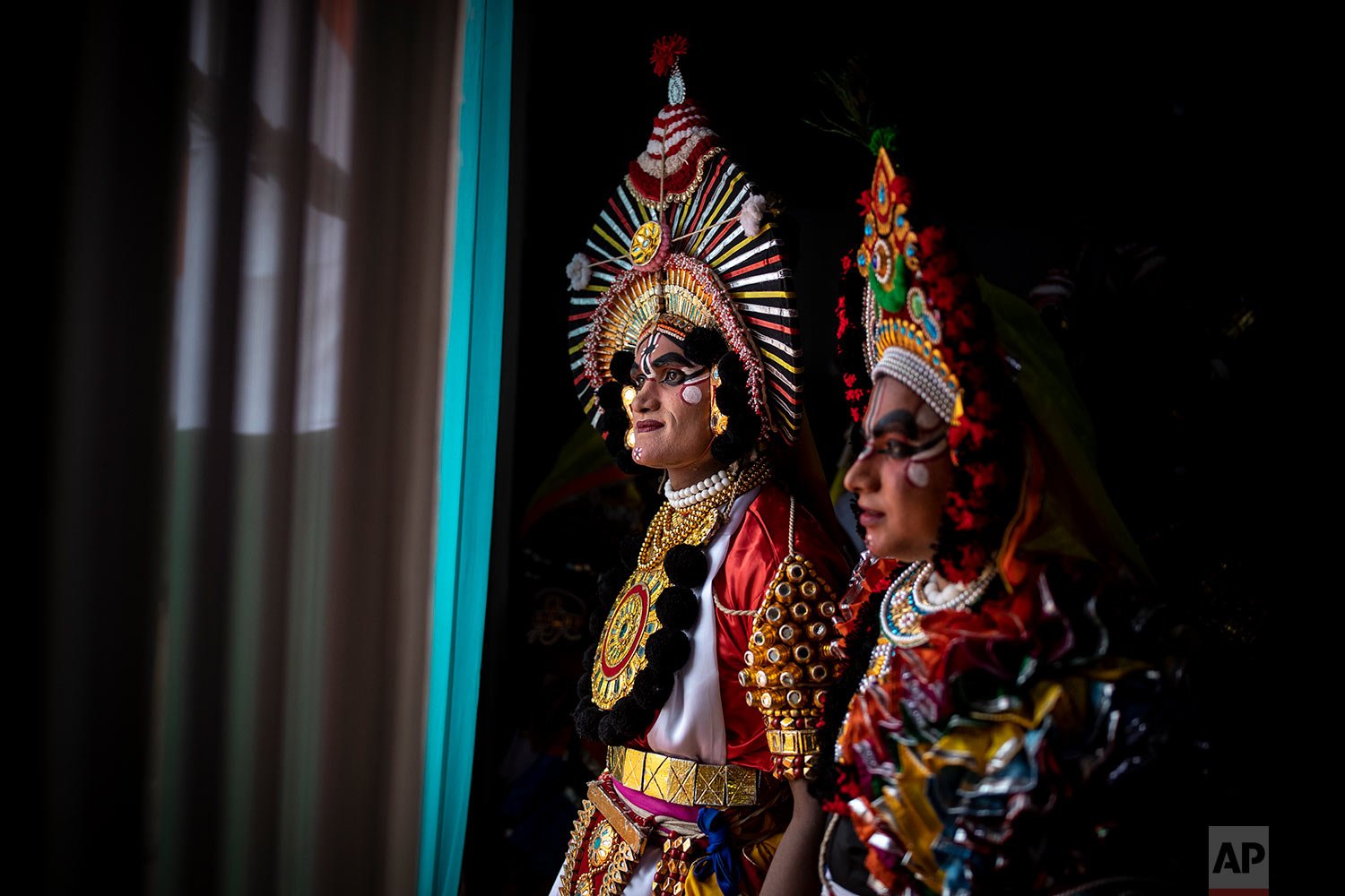  Artists from the Indian state of Karnataka prepare for a press preview of the upcoming Republic Day parade, in New Delhi, India, Saturday, Jan. 22, 2022.  (AP Photo/Altaf Qadri) 