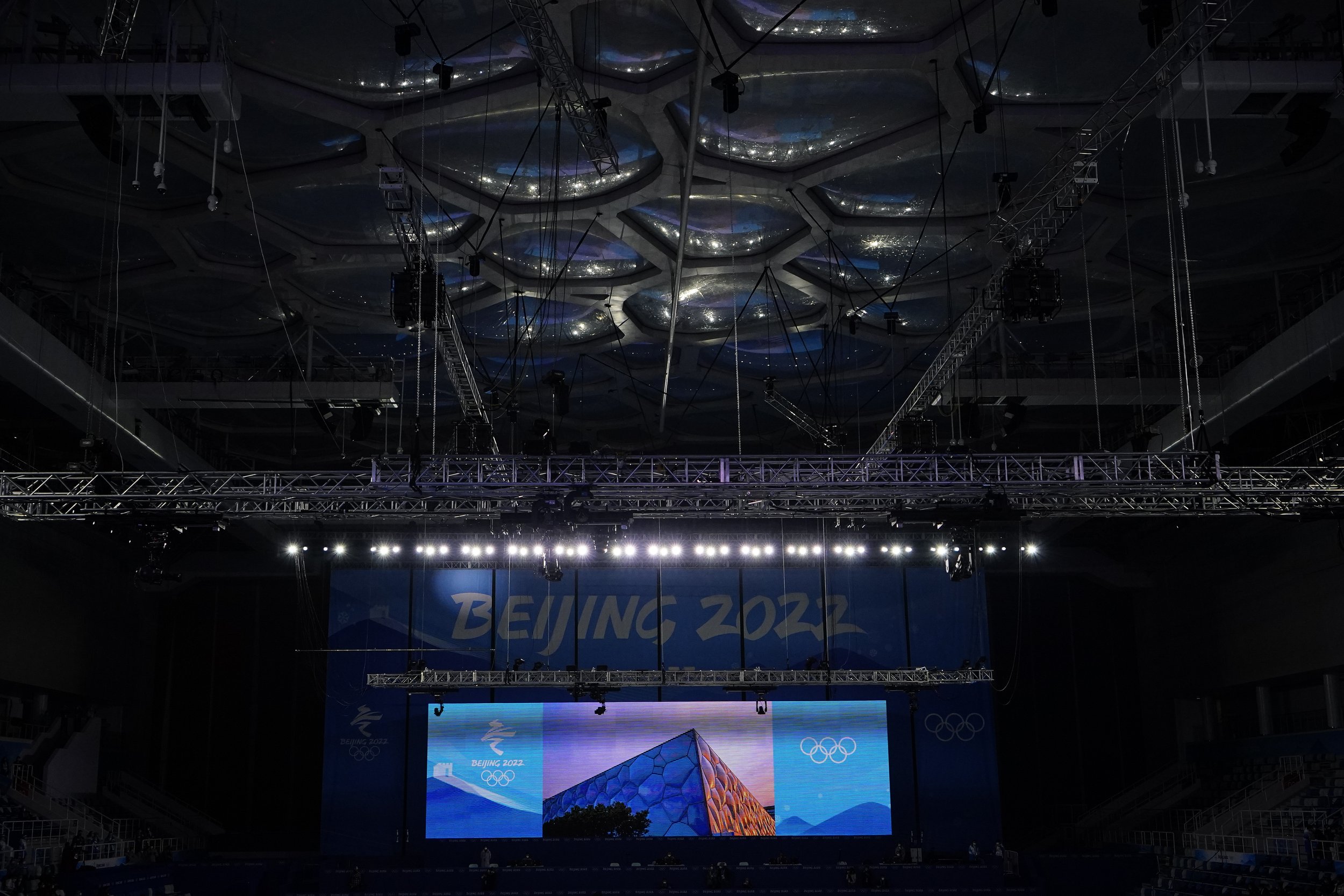  Lights shine at the National Aquatics Center  where curling will be held for the Beijing Winter Olympics Wednesday, Feb. 2, 2022, in Beijing. (AP Photo/Brynn Anderson) 