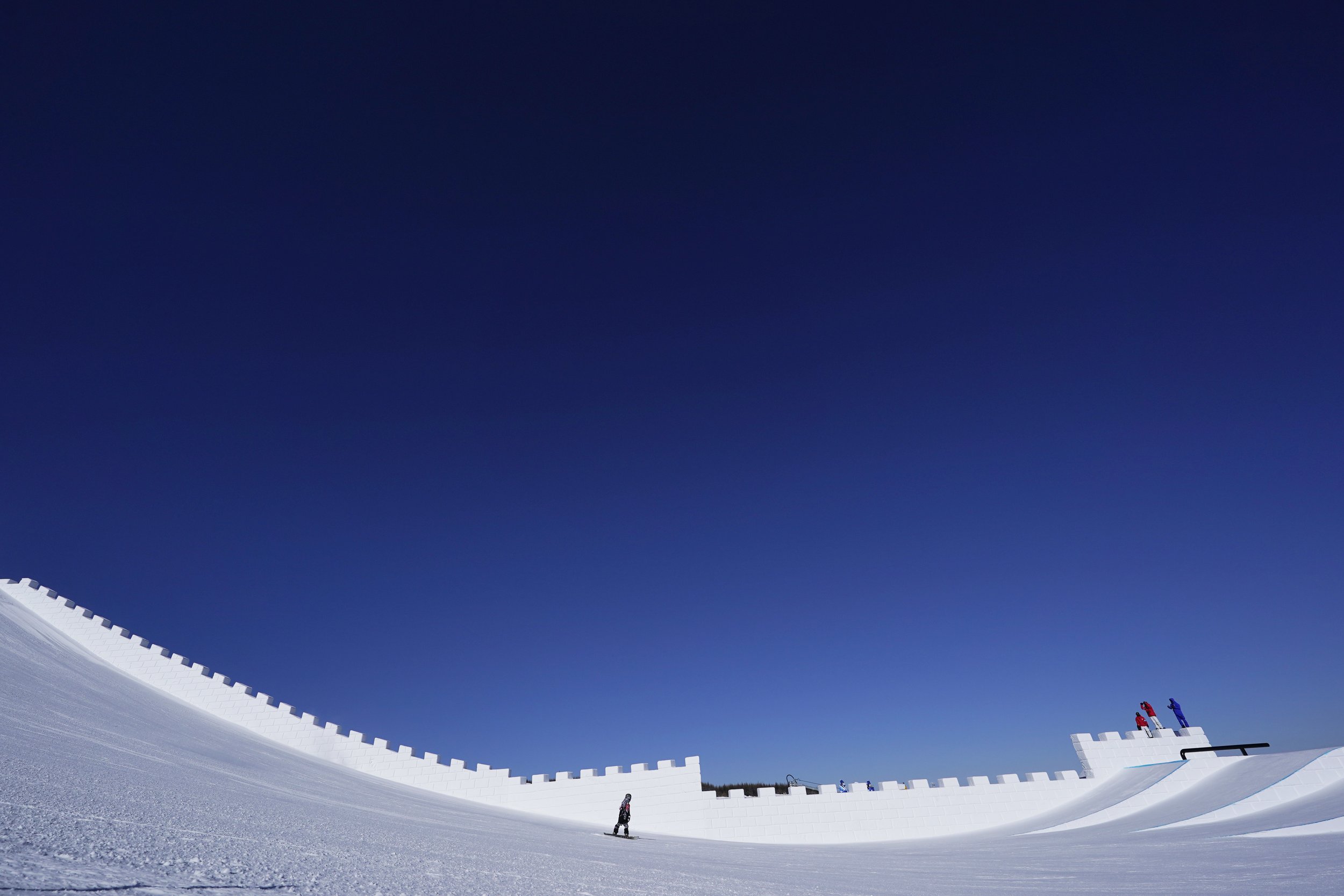  A snowboarder trains on the slopestyle course ahead of ahead of the 2022 Winter Olympics, Feb. 2, 2022, in Zhangjiakou, China. (AP Photo/Gregory Bull) 