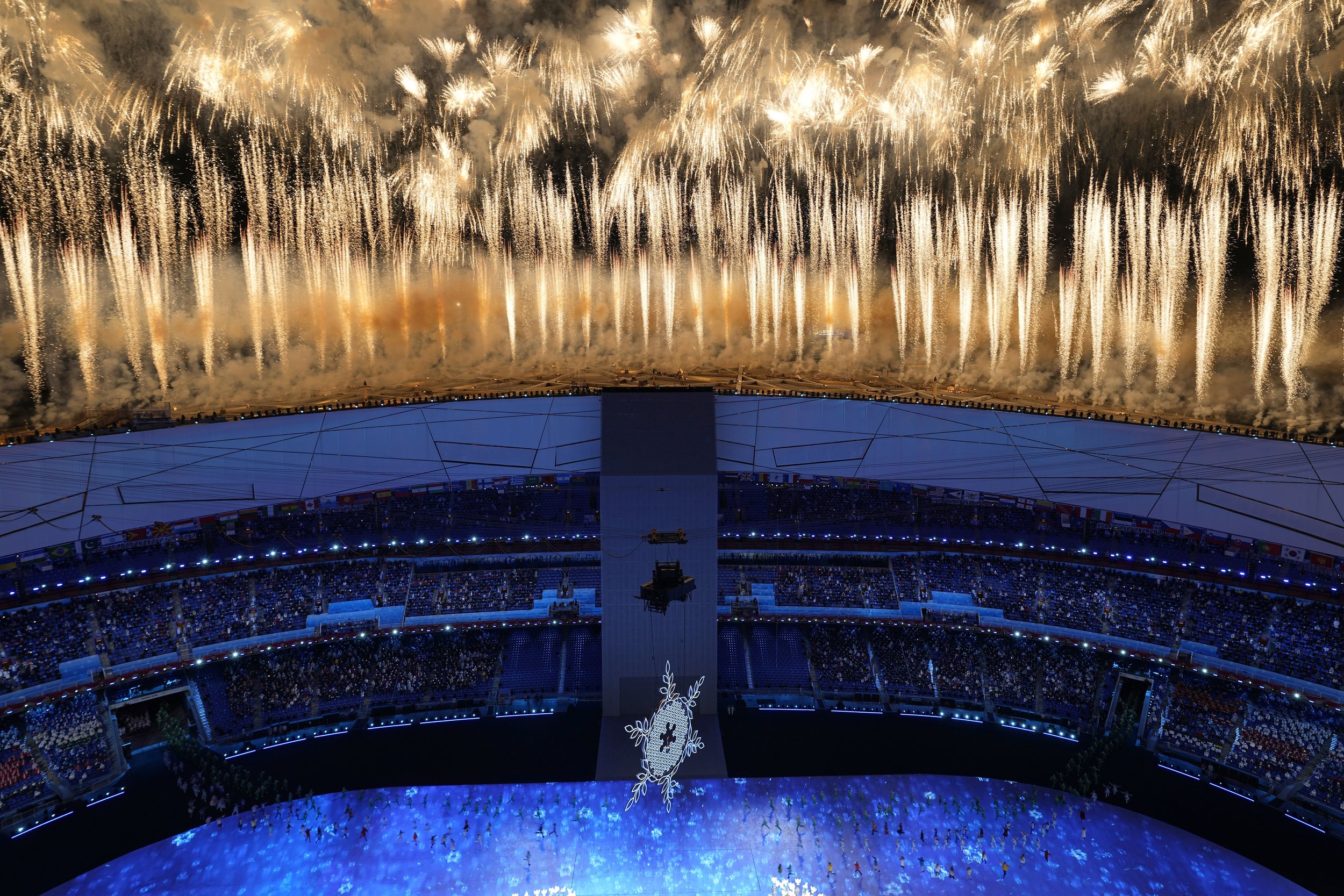  Fireworks light up the sky over Olympic Stadium during the opening ceremony of the 2022 Winter Olympics, Friday, Feb. 4, 2022, in Beijing. (AP Photo/Jeff Roberson) 