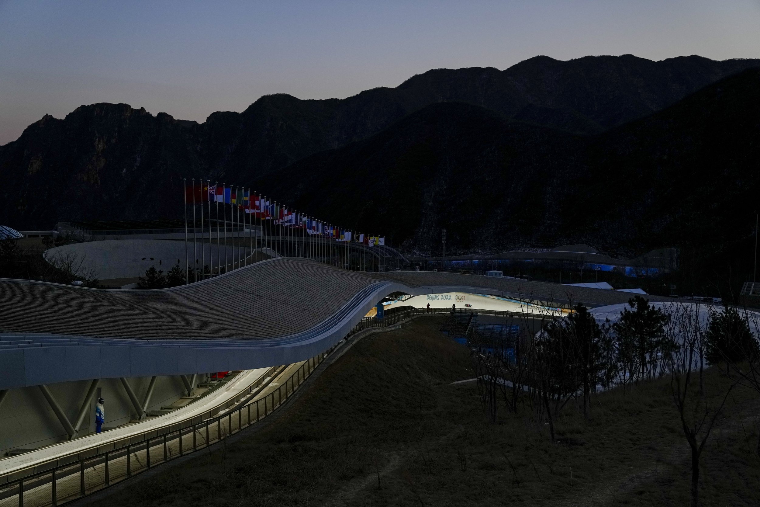  Aileen Frisch, of South Korea, slides during a luge women's training run at the 2022 Winter Olympics, Saturday, Feb. 5, 2022, in the Yanqing district of Beijing. (AP Photo/Pavel Golovkin) 