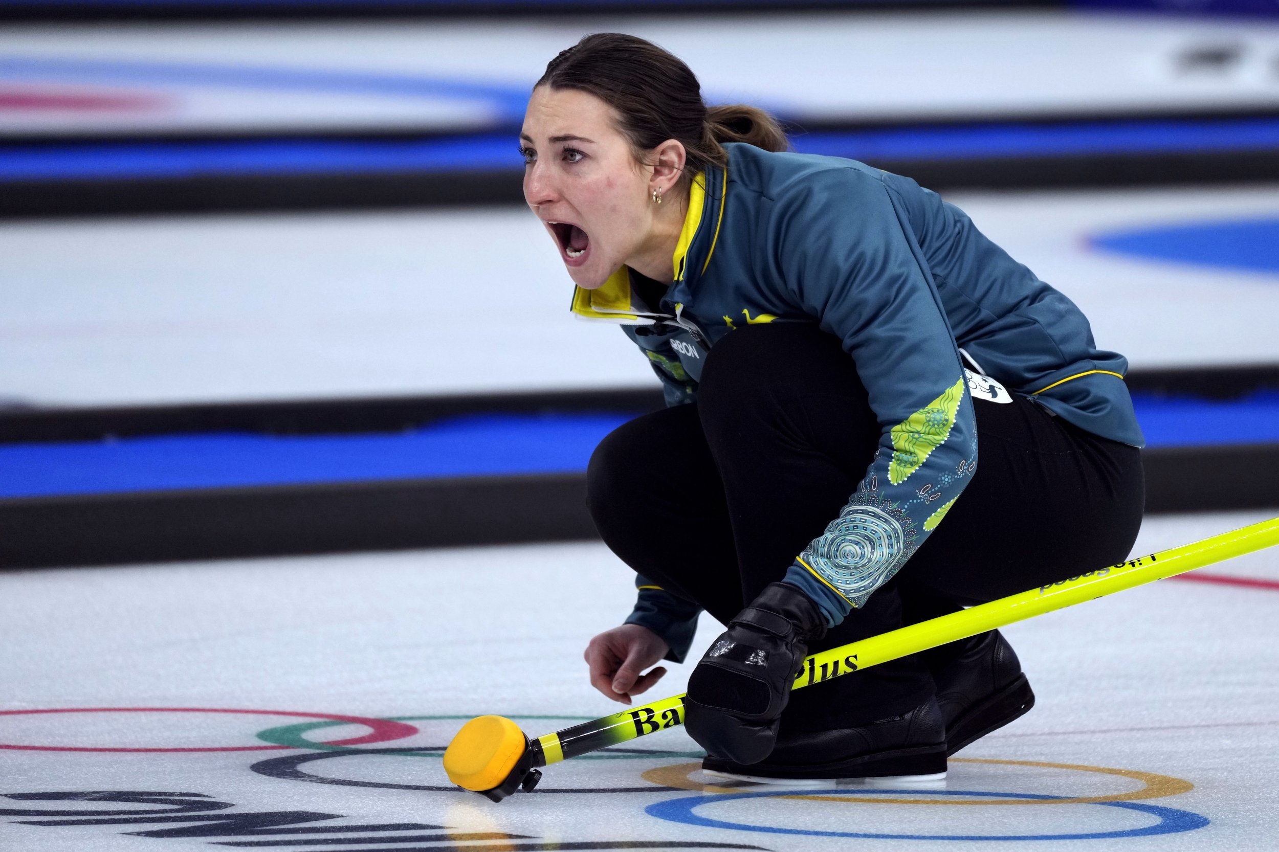  Australia's Tahli Gill, directs her teammate, during the mixed doubles match against Norway, at the 2022 Winter Olympics, Saturday, Feb. 5, 2022, in Beijing. (AP Photo/Nariman El-Mofty) 