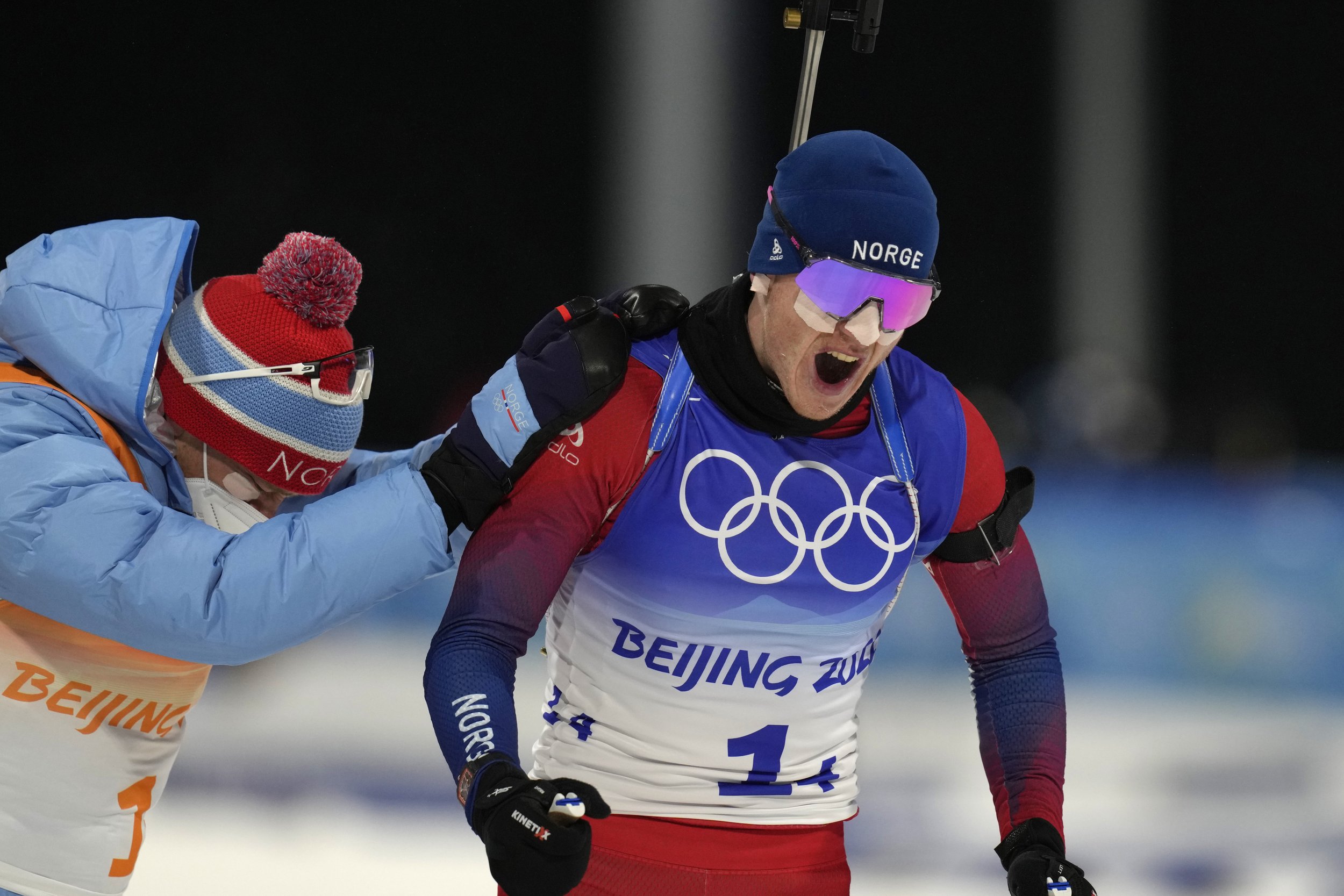  Johannes Thingnes Boe of Norway reacts after winning the biathlon 4x6-kilometer mixed relay at the 2022 Winter Olympics, Saturday, Feb. 5, 2022, in Zhangjiakou, China. (AP Photo/Kirsty Wigglesworth) 