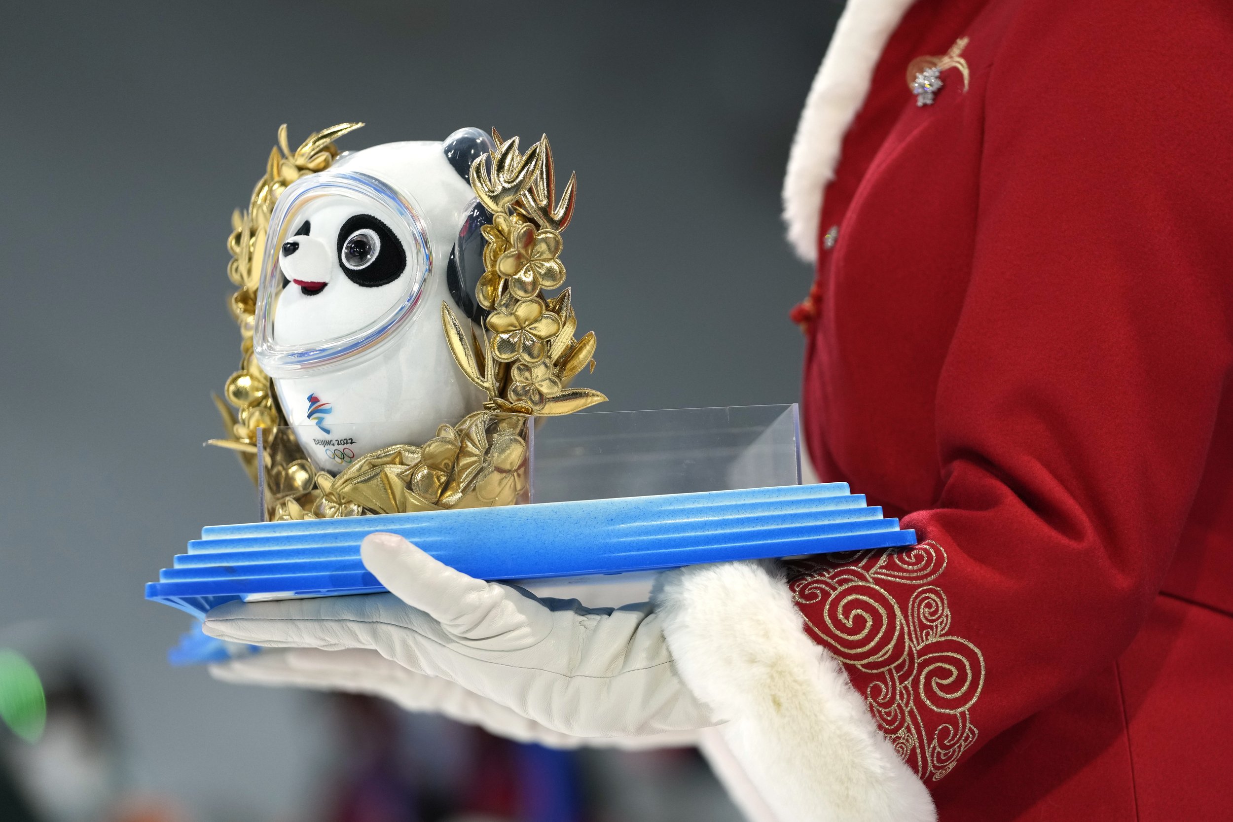  A mascot that is presented to the medal winners is seen during the award ceremony for the women's moguls at Genting Snow Park at the 2022 Winter Olympics, Sunday, Feb. 6, 2022, in Zhangjiakou, China. (AP Photo/Francisco Seco) 