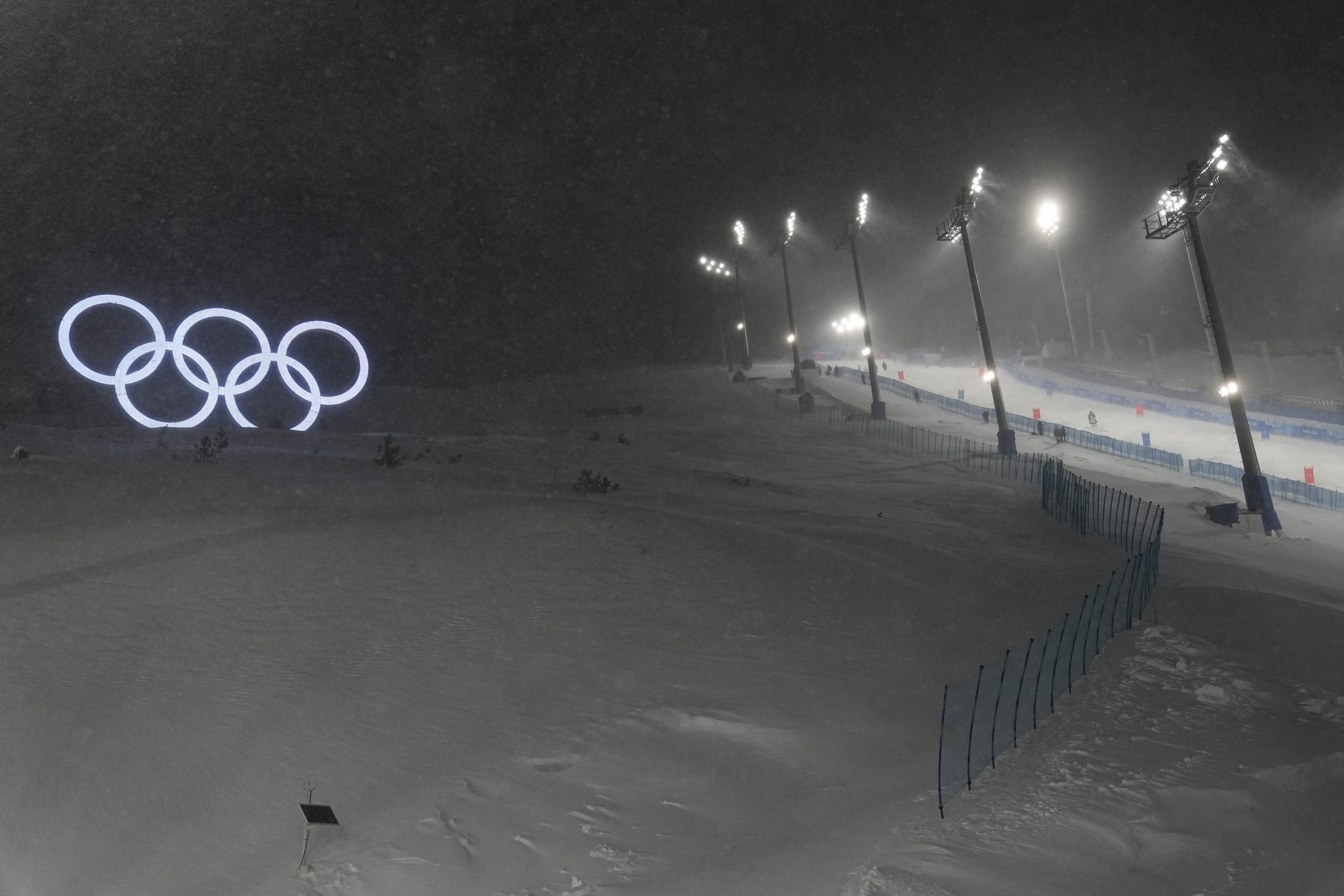  Olympic rings sit next to the moguls course ahead of the 2022 Winter Olympics, Sunday, Jan. 30, 2022, in Zhangjiakou, China. (AP Photo/Jae C. Hong) 