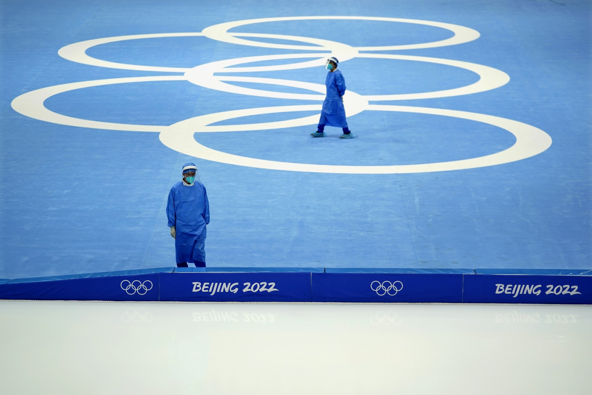  Medical personnel stand ready for activity during a scheduled speedskating practice session inside at the National Speed Skating Oval the 2022 Winter Olympics, Thursday, Jan. 27, 2022, in Beijing. (AP Photo/Jeff Roberson) 