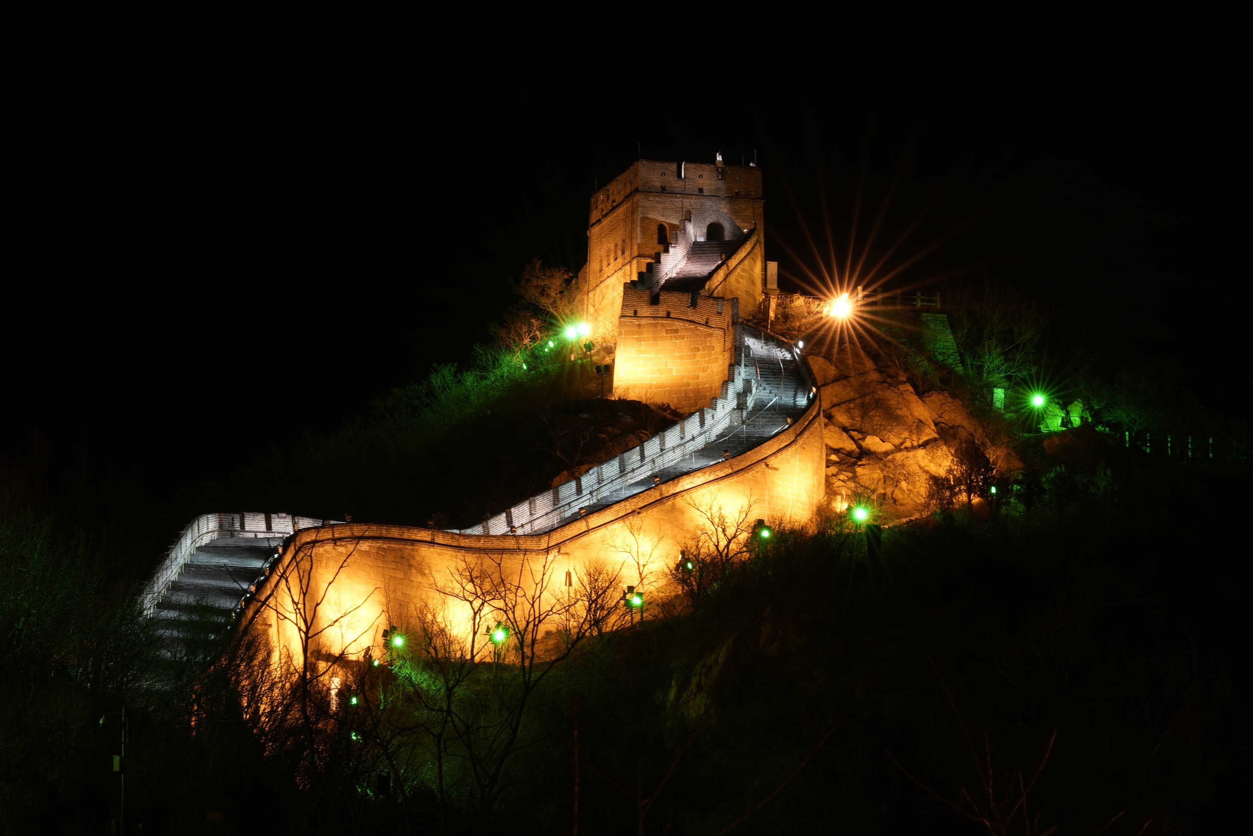  The Badaling section of the Great Wall of China is lit on the outskirts of Beijing on Tuesday, Feb. 8, 2022, in Beijing. (AP Photo/Ng Han Guan) 