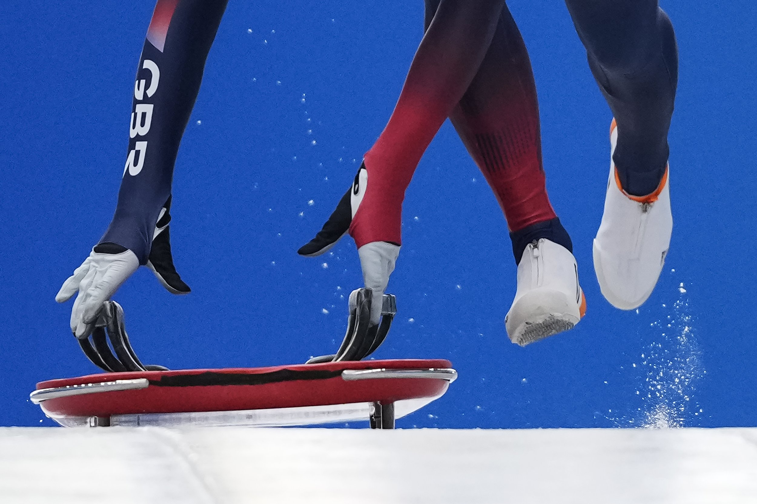  Laura Deas of Britain starts during the women's skeleton training run at the 2022 Winter Olympics, Tuesday, Feb. 8, 2022, in the Yanqing district of Beijing. (AP Photo/Pavel Golovkin) 