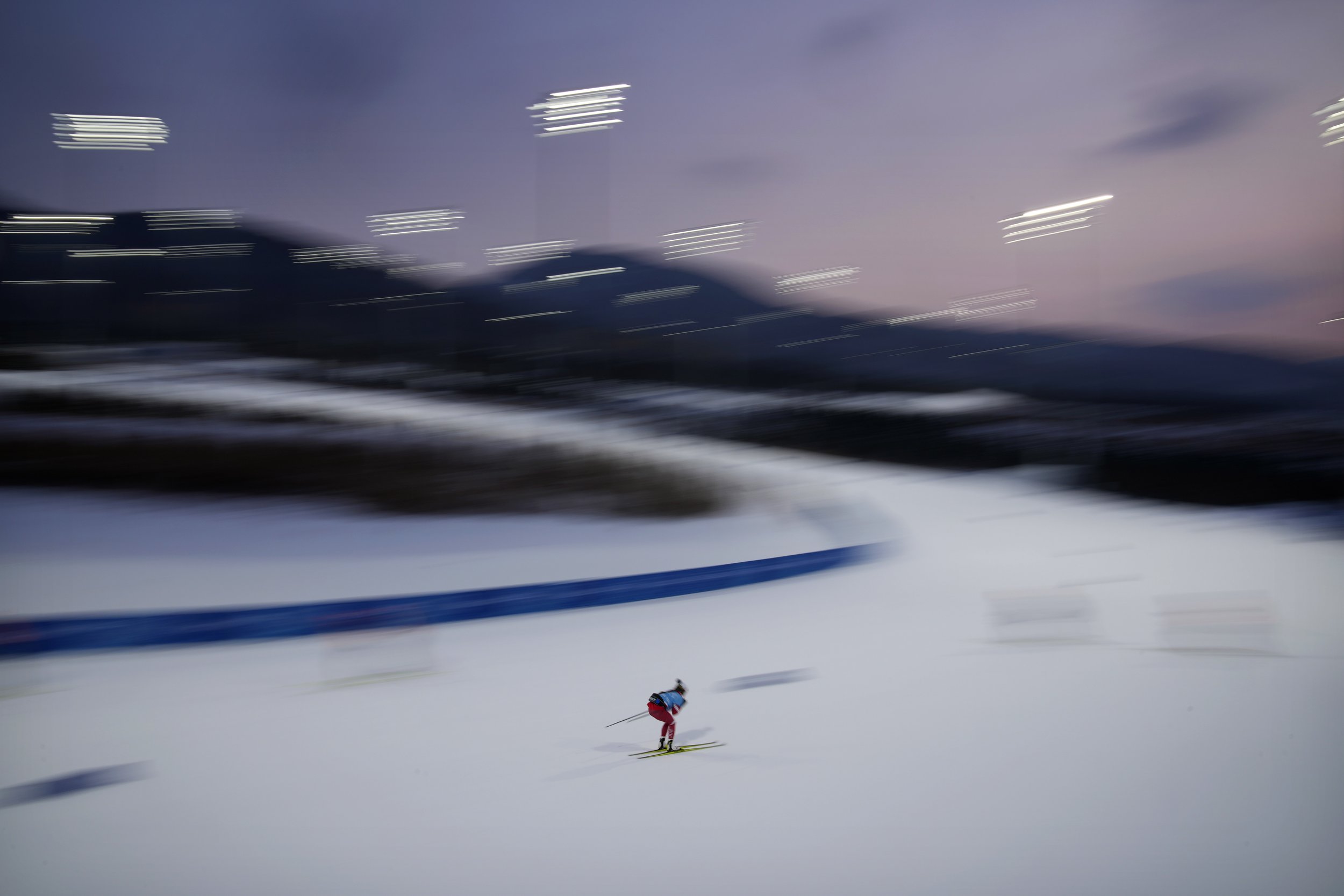  A Russian athlete trains during cross-country skiing training at the 2022 Winter Olympics, Wednesday, Feb. 9, 2022, in Zhangjiakou, China. (AP Photo/John Locher) 