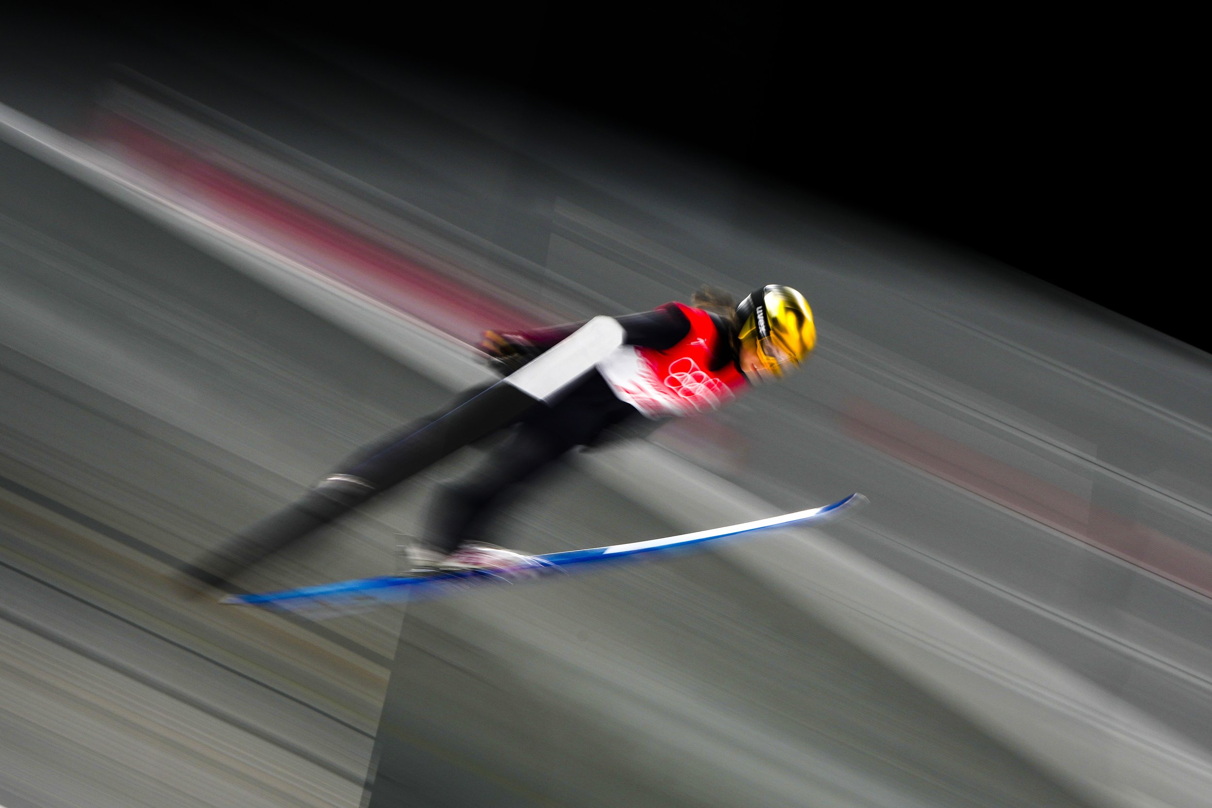  Juliane Seyfarth, of Germany, soars through the air during the women's normal hill individual first round at the 2022 Winter Olympics, Saturday, Feb. 5, 2022, in Zhangjiakou, China. (AP Photo/Matthias Schrader) 
