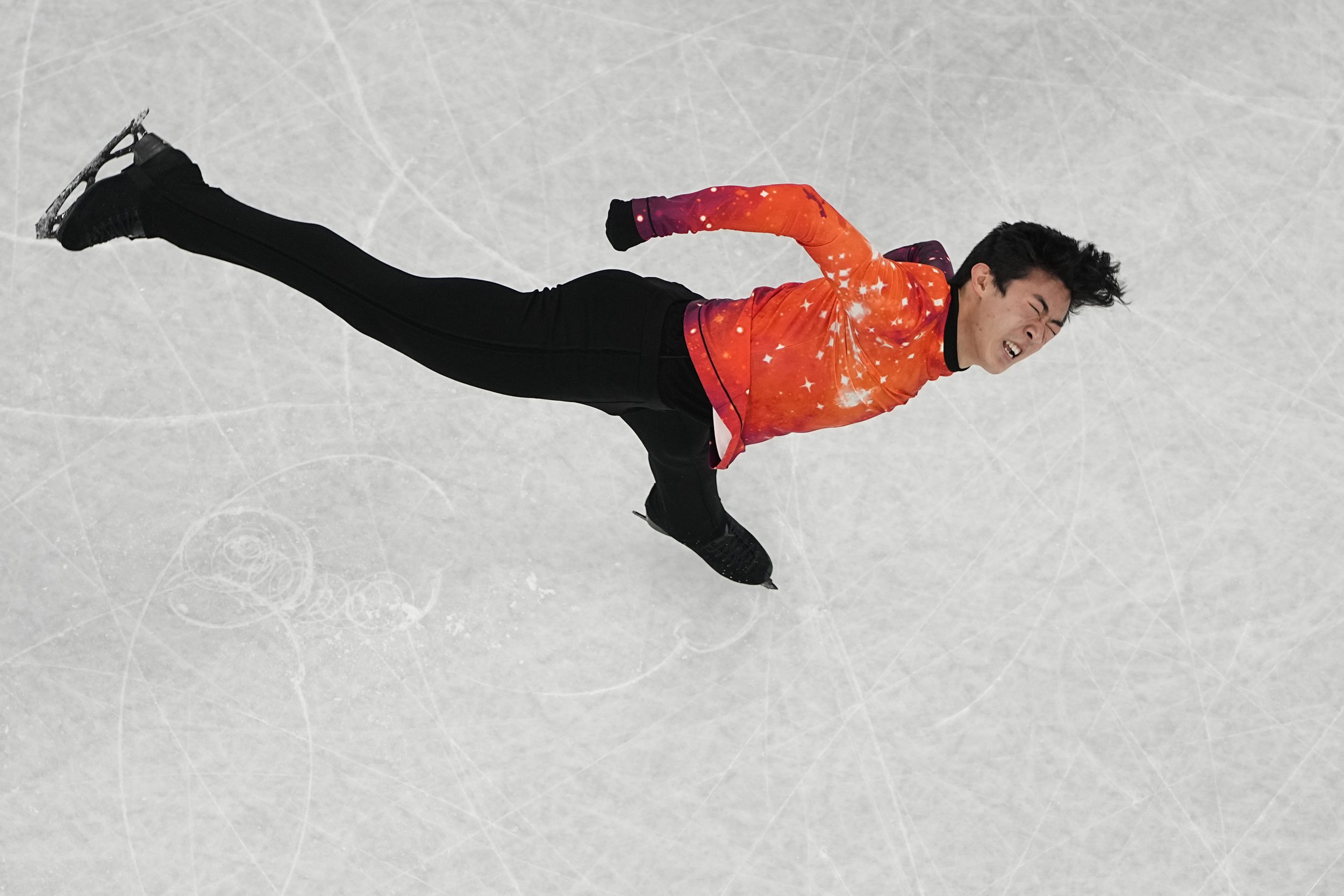  Nathan Chen, of the United States, competes in the men's free skate program during the figure skating event at the 2022 Winter Olympics, Thursday, Feb. 10, 2022, in Beijing. (AP Photo/Jeff Roberson) 