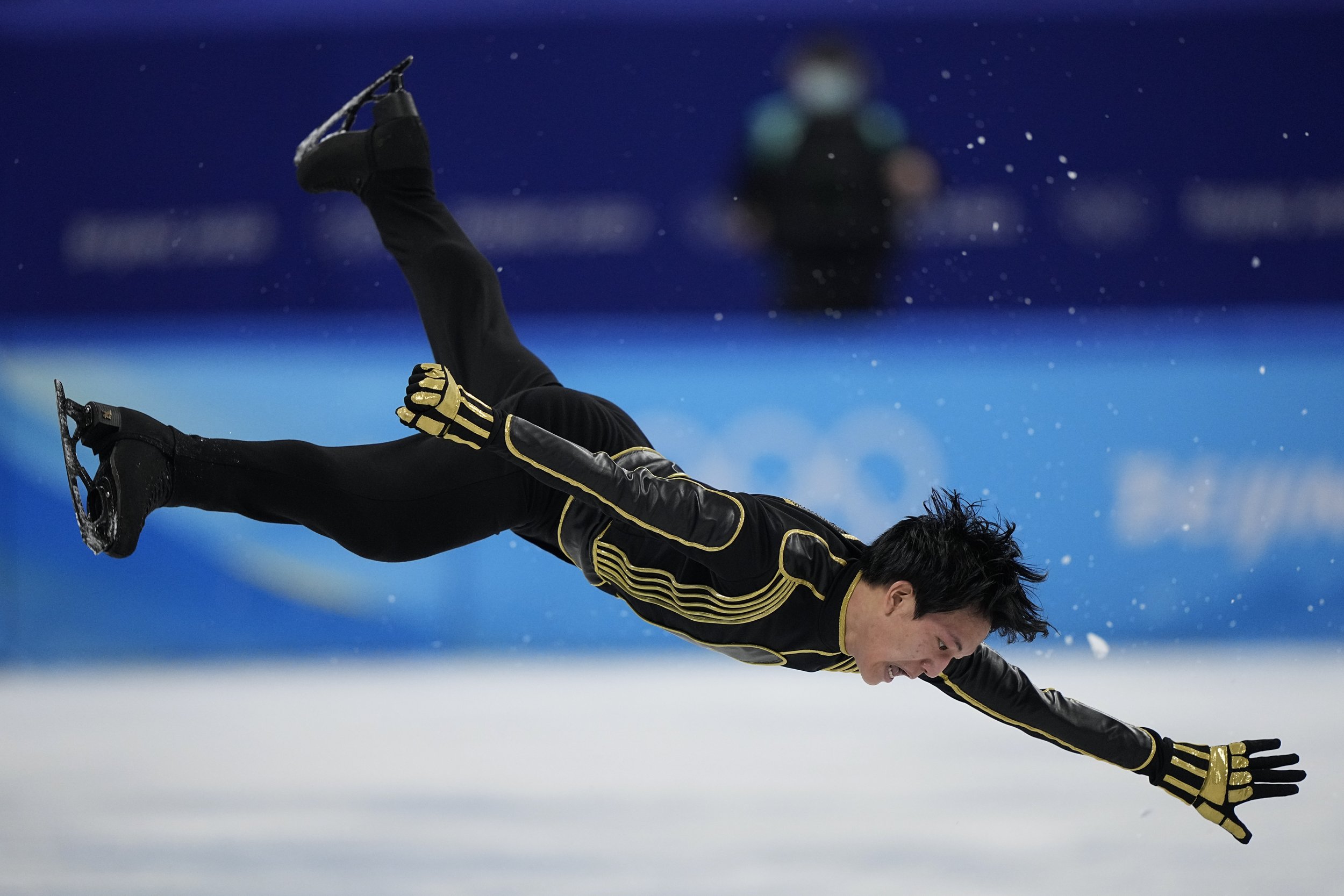  Adam Siao Him Fa of France, competes in the men's free skate program during the figure skating event at the 2022 Winter Olympics, Thursday, Feb. 10, 2022, in Beijing. (AP Photo/David J. Phillip) 