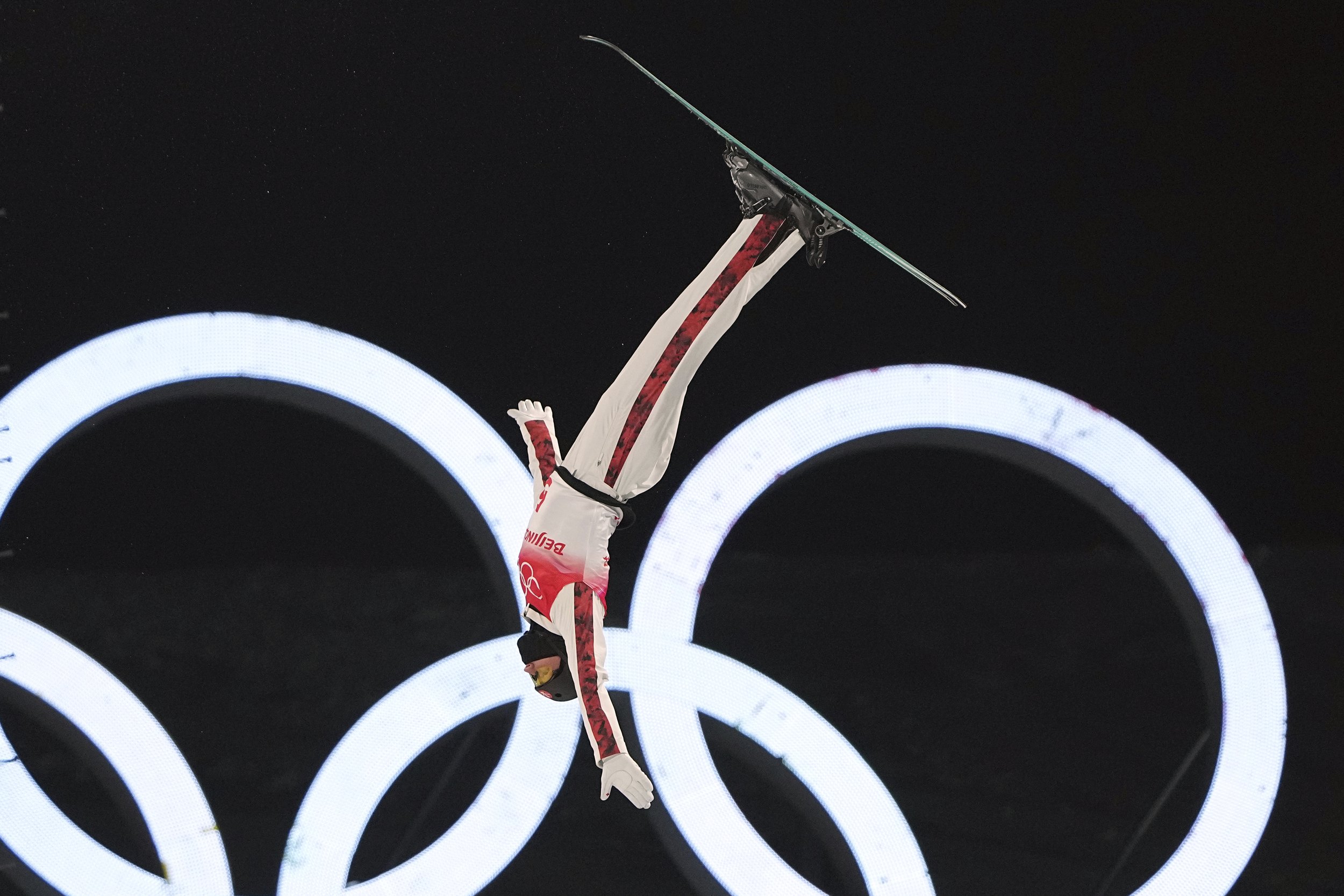  Canada's Lewis Irving competes during the mixed team aerials finals at the 2022 Winter Olympics, Thursday, Feb. 10, 2022, in Zhangjiakou, China. (AP Photo/Gregory Bull) 