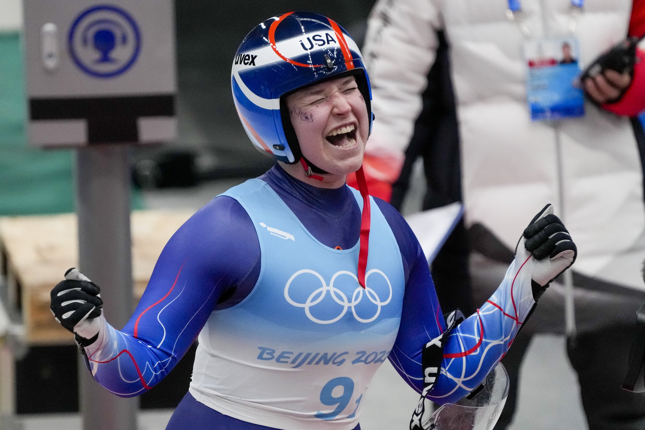  Ashley Farquharson, of the United States, celebrates after finishing her rung in the luge team relay at the 2022 Winter Olympics, Thursday, Feb. 10, 2022, in the Yanqing district of Beijing. (AP Photo/Mark Schiefelbein) 