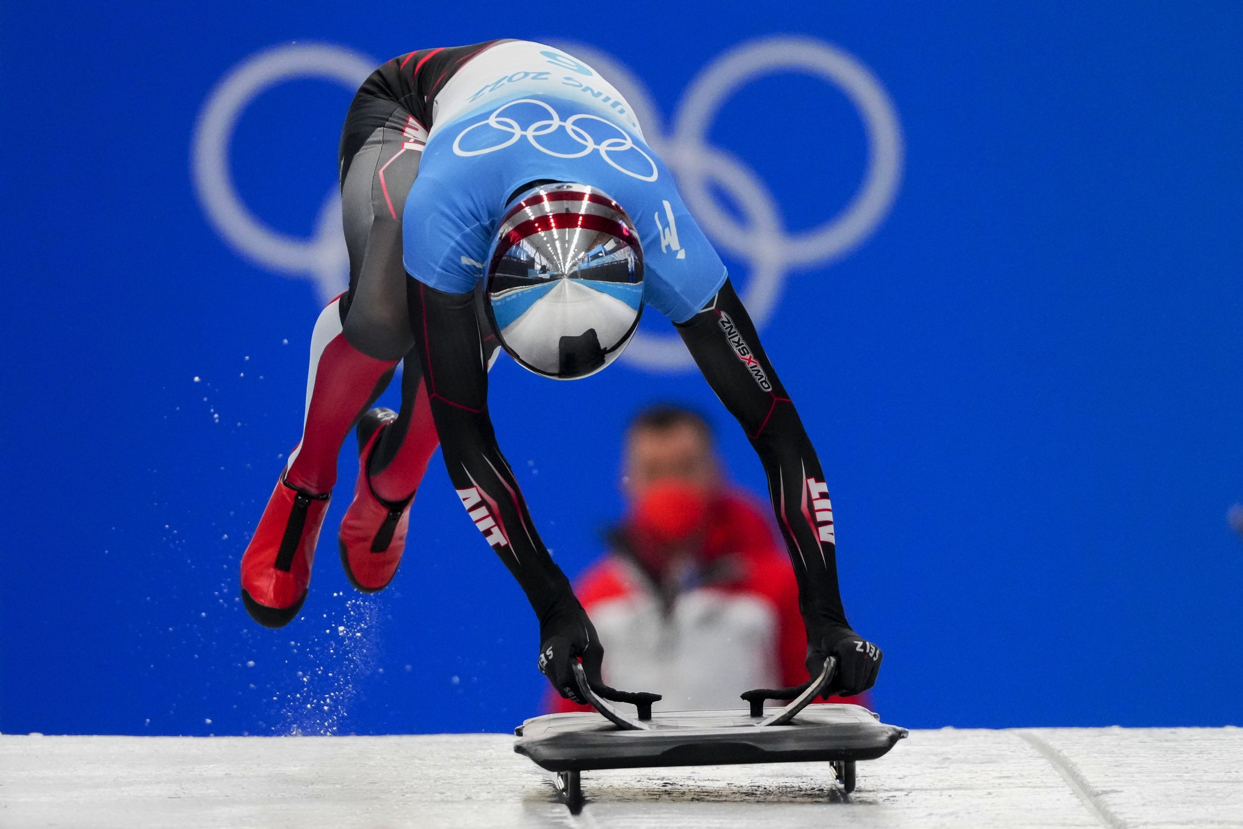  Janine Flock, of Austria, slides during the women's skeleton run 2 at the 2022 Winter Olympics, Friday, Feb. 11, 2022, in the Yanqing district of Beijing. (AP Photo/Dmitri Lovetsky) 