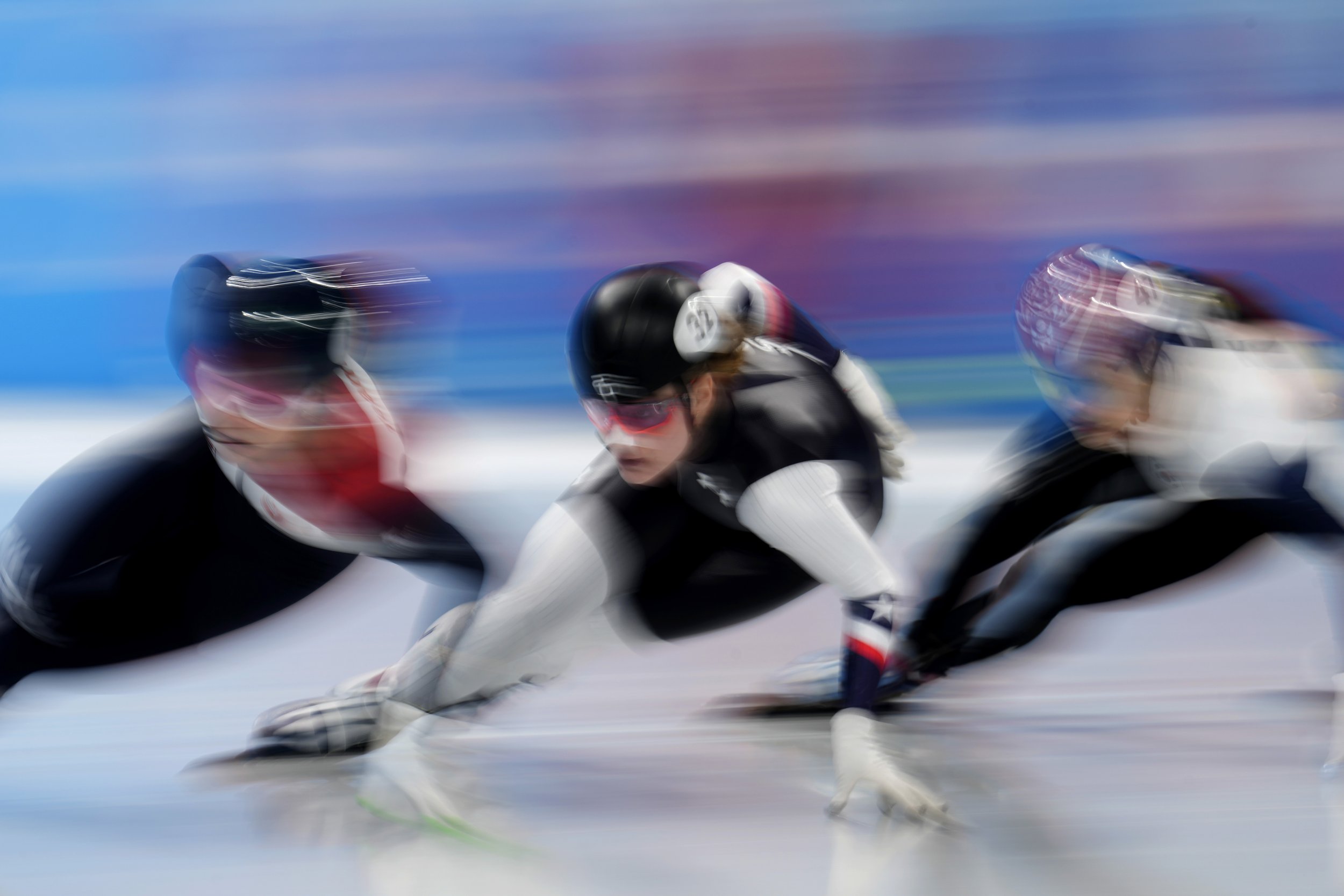  Skaters race in the B final of the women's 1000-meters during the short track speedskating competition at the 2022 Winter Olympics, Friday, Feb. 11, 2022, in Beijing. (AP Photo/Natacha Pisarenko) 