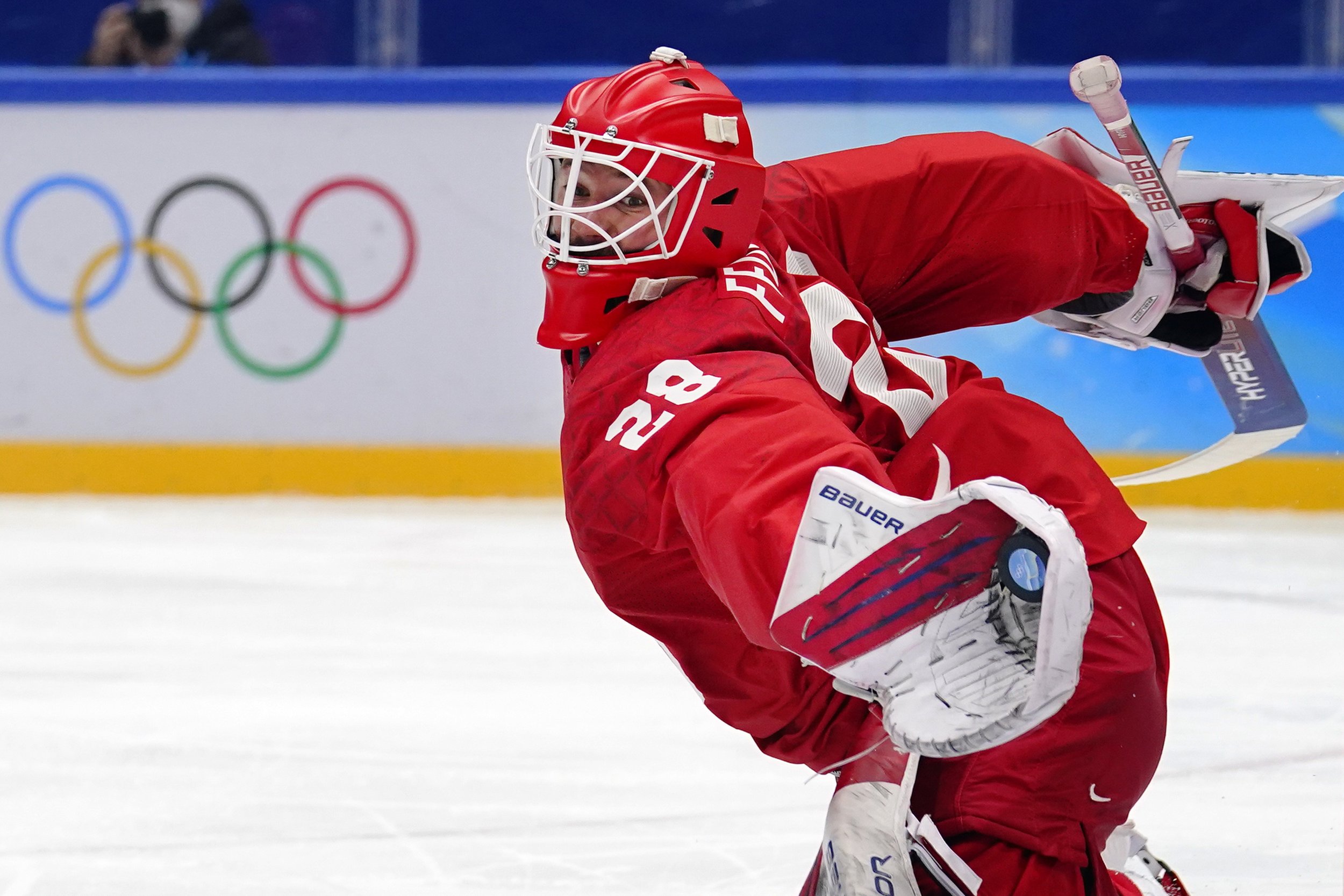  Russian Olympic Committee goalkeeper Ivan Fedotov gloves a shot against Czech Republic during a preliminary round men's hockey game at the 2022 Winter Olympics, Saturday, Feb. 12, 2022, in Beijing. (AP Photo/Matt Slocum) 