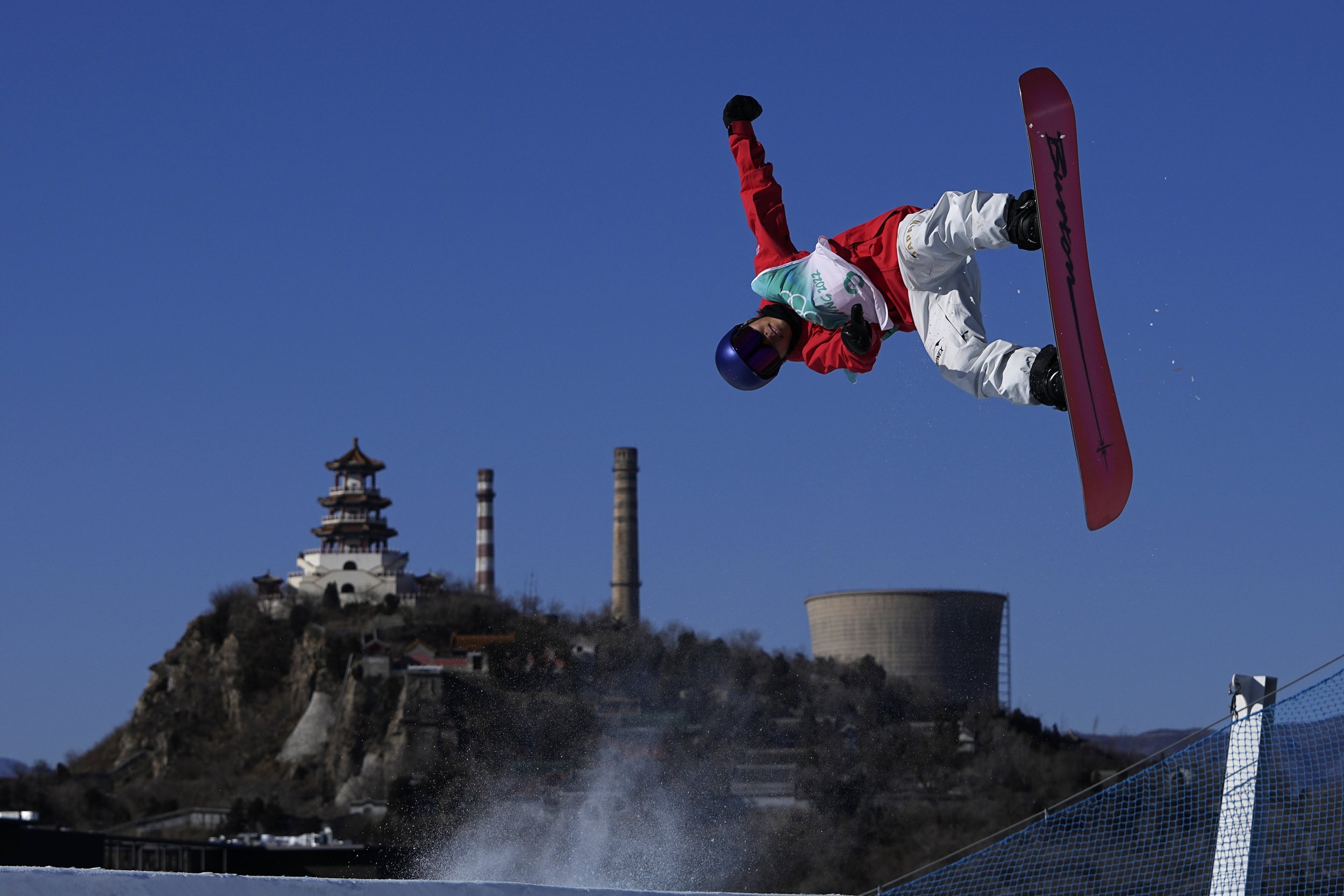  Takeru Otsuka of Japan competes during the men's snowboard big air qualifications of the 2022 Winter Olympics, Monday, Feb. 14, 2022, in Beijing. (AP Photo/Jae C. Hong) 