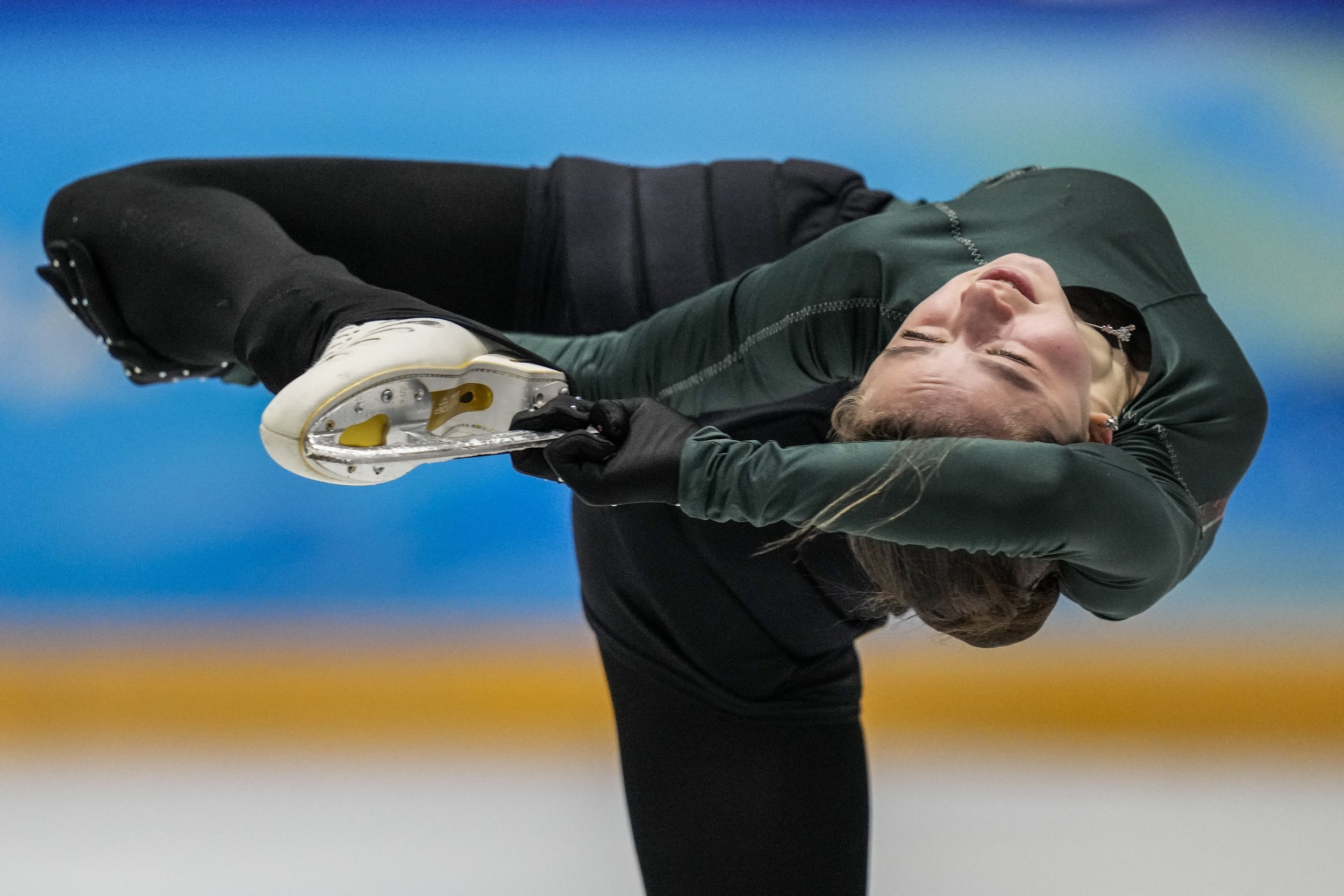  Kamila Valieva, of the Russian Olympic Committee, trains at the 2022 Winter Olympics, Monday, Feb. 14, 2022, in Beijing. (AP Photo/Bernat Armangue) 