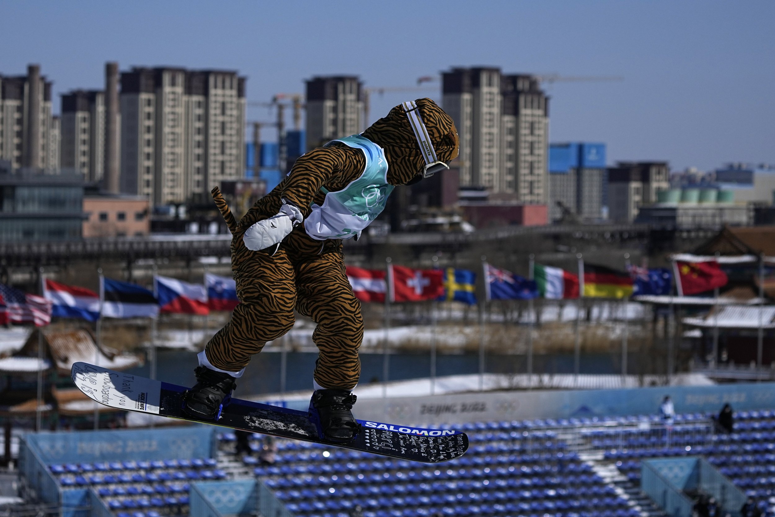  Lucile Lefevre of France competes during the women's snowboard big air qualifications of the 2022 Winter Olympics, Monday, Feb. 14, 2022, in Beijing. (AP Photo/Ashley Landis) 