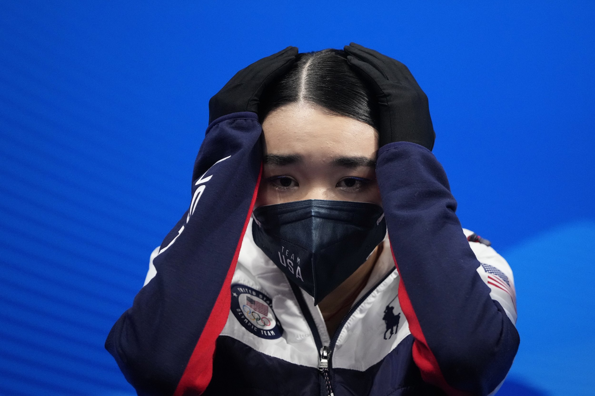  Karen Chen, of the United States, reacts after the women's short program during the figure skating at the 2022 Winter Olympics, Tuesday, Feb. 15, 2022, in Beijing. (AP Photo/Natacha Pisarenko) 