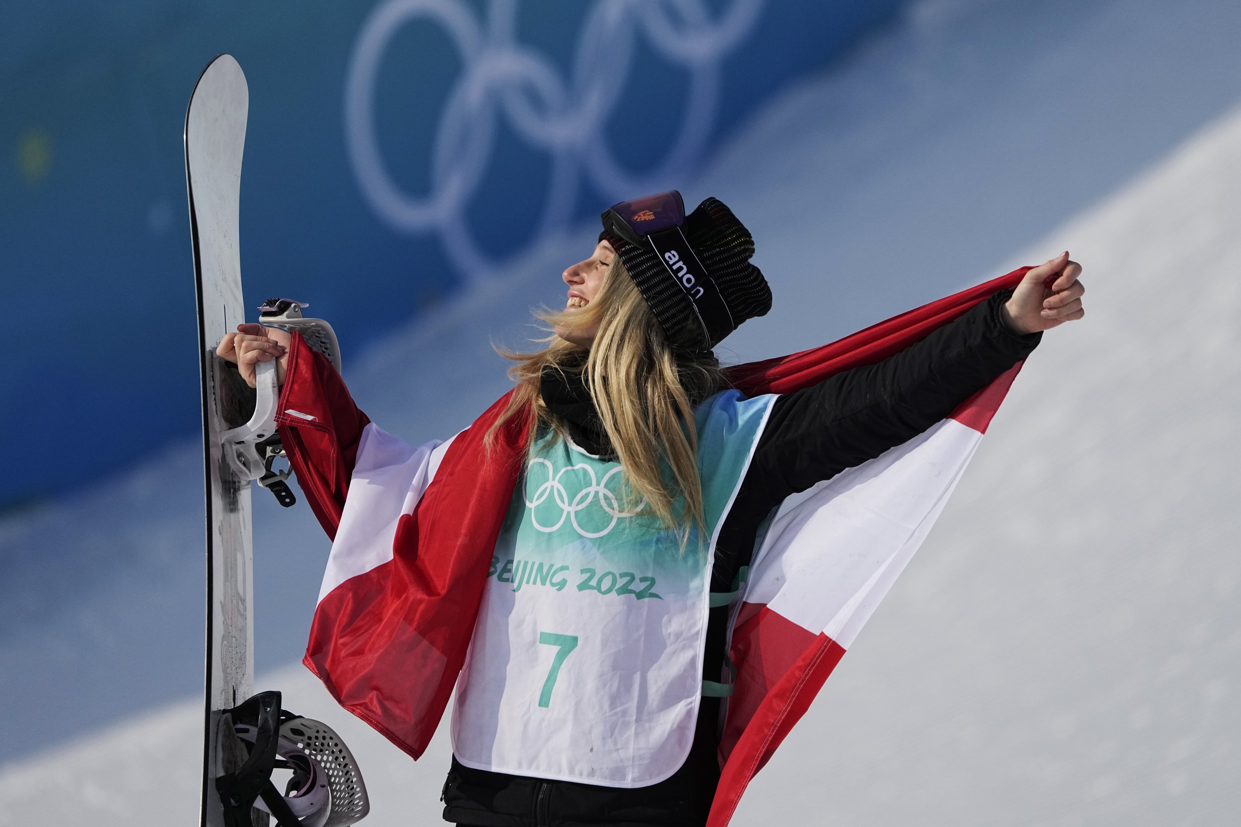  Gold medal winner Anna Gasser of Austria poses during a venue ceremony for the women's snowboard big air finals of the 2022 Winter Olympics, Tuesday, Feb. 15, 2022, in Beijing. (AP Photo/Jae C. Hong) 
