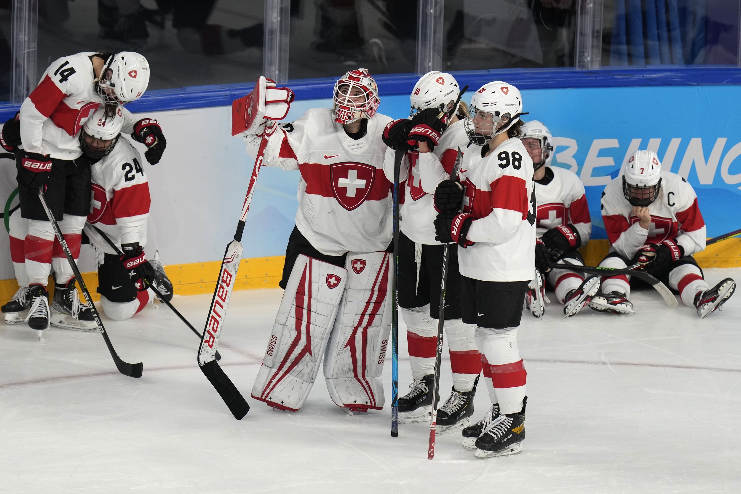  Switzerland reacts after losing to Finland in the women's bronze medal hockey game at the 2022 Winter Olympics, Wednesday, Feb. 16, 2022, in Beijing. (AP Photo/Petr David Josek) 
