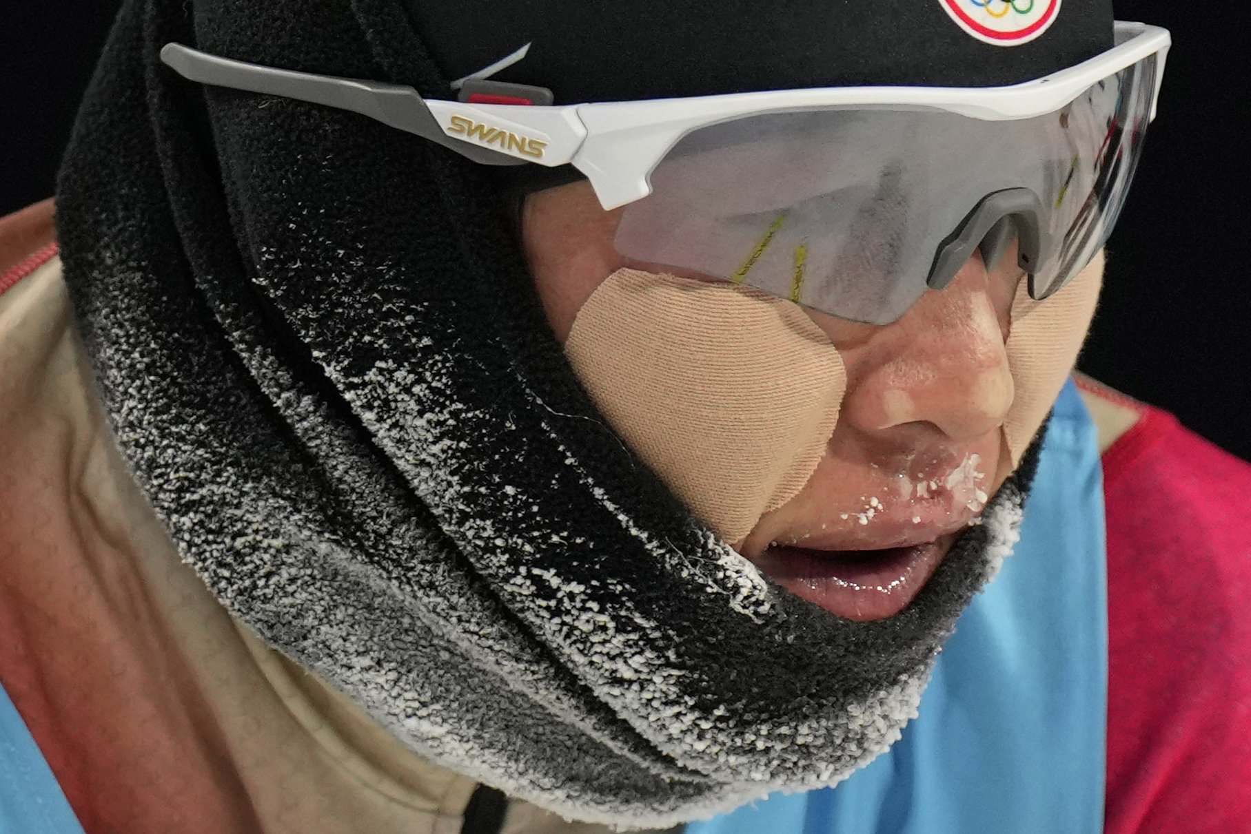  Japan's Ryota Yamamoto reacts after finishing the cross-country skiing portion of the individual Gundersen large hill/10km competition at the 2022 Winter Olympics, Tuesday, Feb. 15, 2022, in Zhangjiakou, China. (AP Photo/Alessandra Tarantino) 
