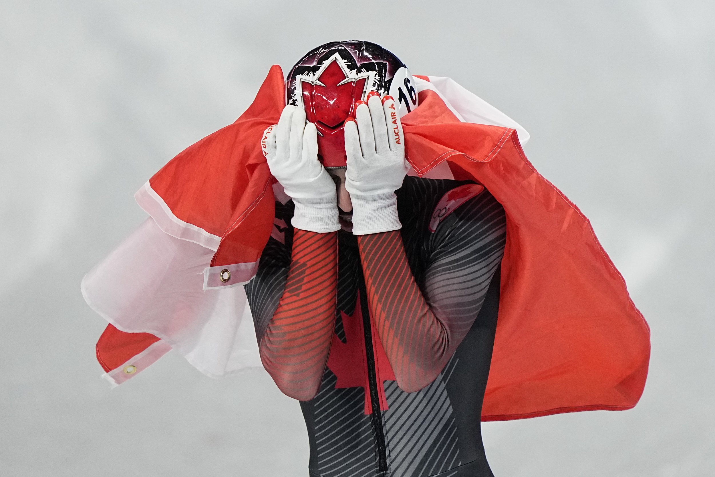  Steven Dubois, of Canada, reacts after his second place finish in the men's 1500-meters final during the short track speedskating competition at the 2022 Winter Olympics, Wednesday, Feb. 9, 2022, in Beijing. (AP Photo/David J. Phillip) 