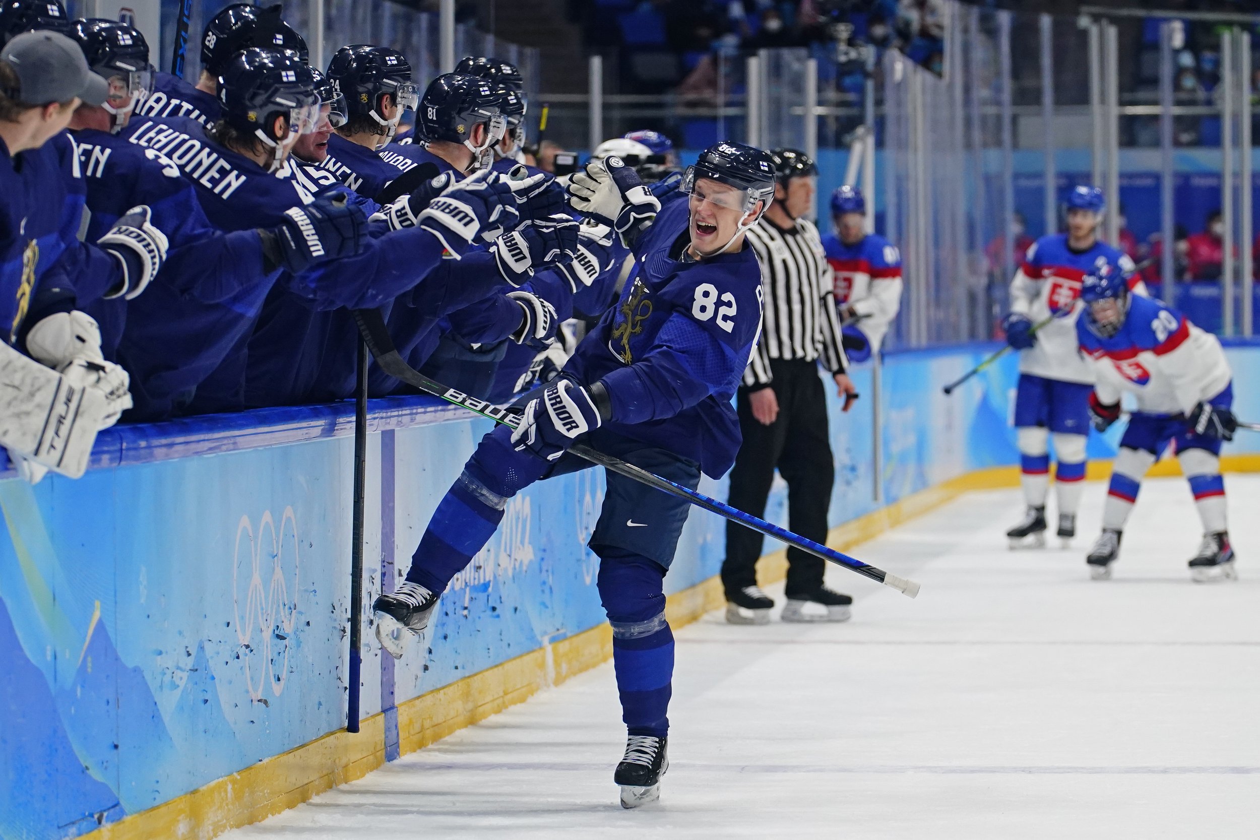  Finland's Harri Pesonen (82) celebrates after scoring a goal against Slovakia during a men's semifinal hockey game at the 2022 Winter Olympics, Friday, Feb. 18, 2022, in Beijing. Finland won 2-0. (AP Photo/Matt Slocum) 