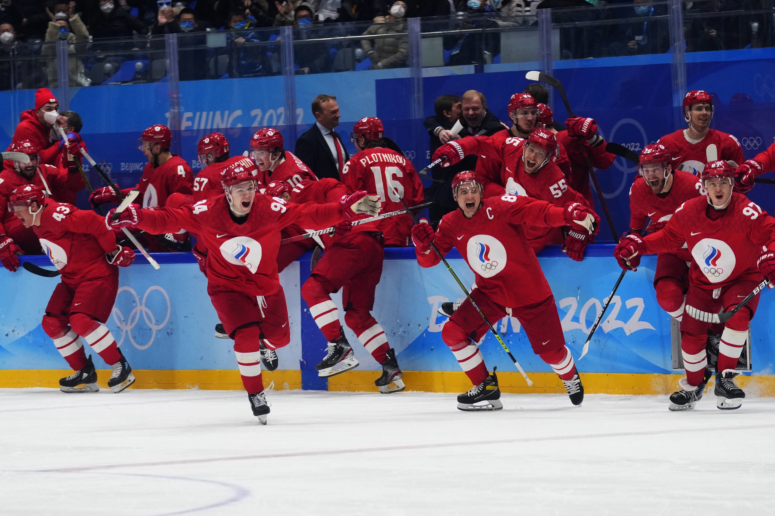  The Russian Olympic Committee celebrates the winning goal by Arseni Gritsyuk during a shootout in a men's semifinal hockey game against Sweden at the 2022 Winter Olympics, Friday, Feb. 18, 2022, in Beijing. (AP Photo/Petr David Josek) 