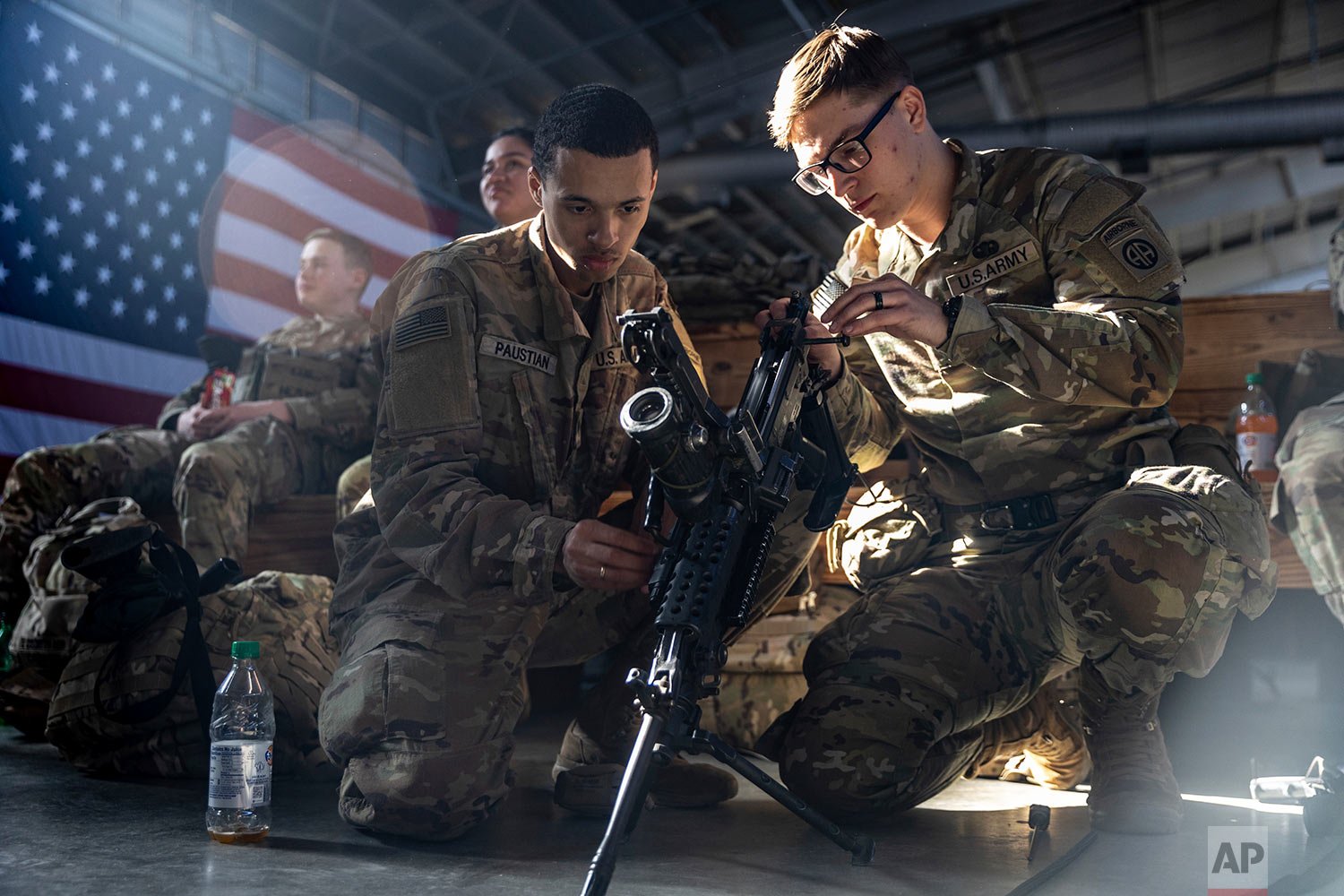  Members of the 82nd Airborne Division of the U.S. Army clean weaponry ahead of deployment to Poland from Fort Bragg, N.C. on Monday, Feb. 14, 2022. They are among soldiers the Department of Defense is sending in a demonstration of American commitmen