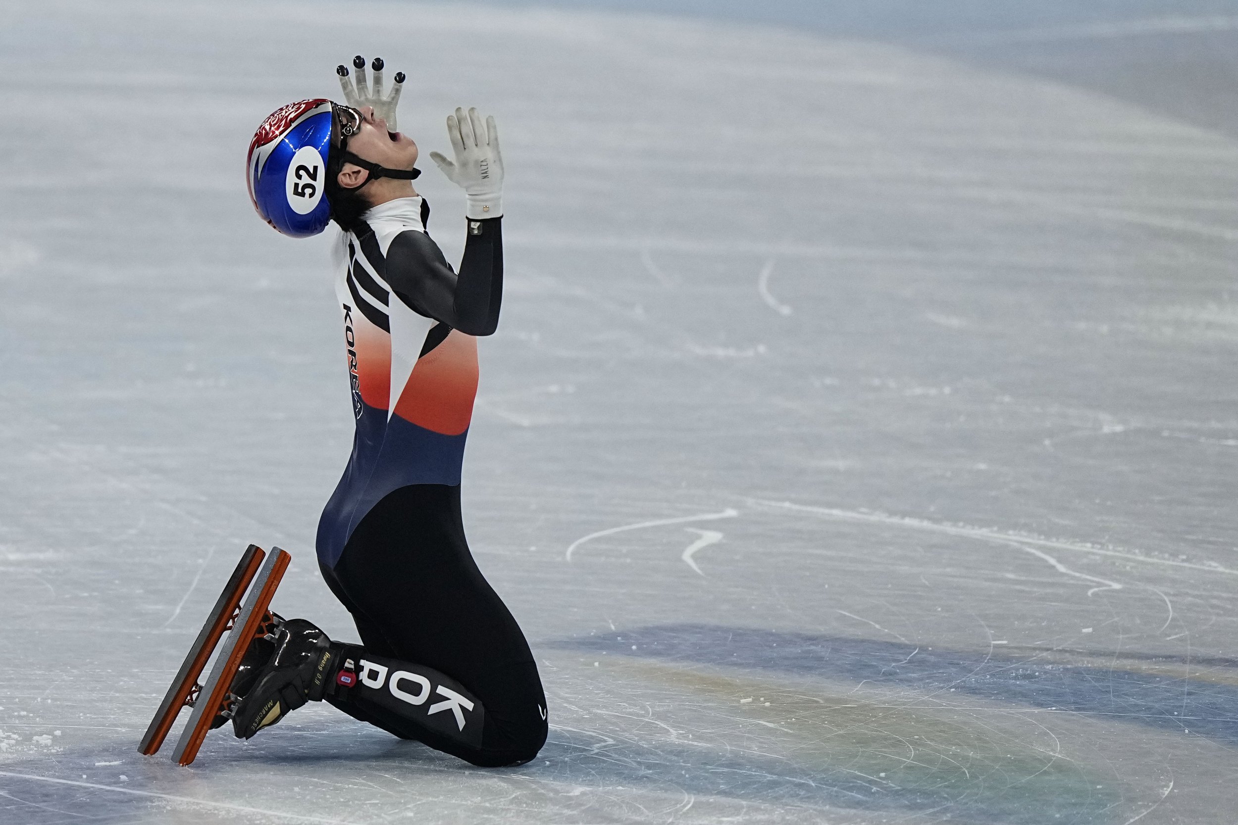  Hwang Dae-heon of South Korea, reacts after winning his men's 1500-meters final during the short track speedskating competition at the 2022 Winter Olympics, Wednesday, Feb. 9, 2022, in Beijing. (AP Photo/David J. Phillip) 