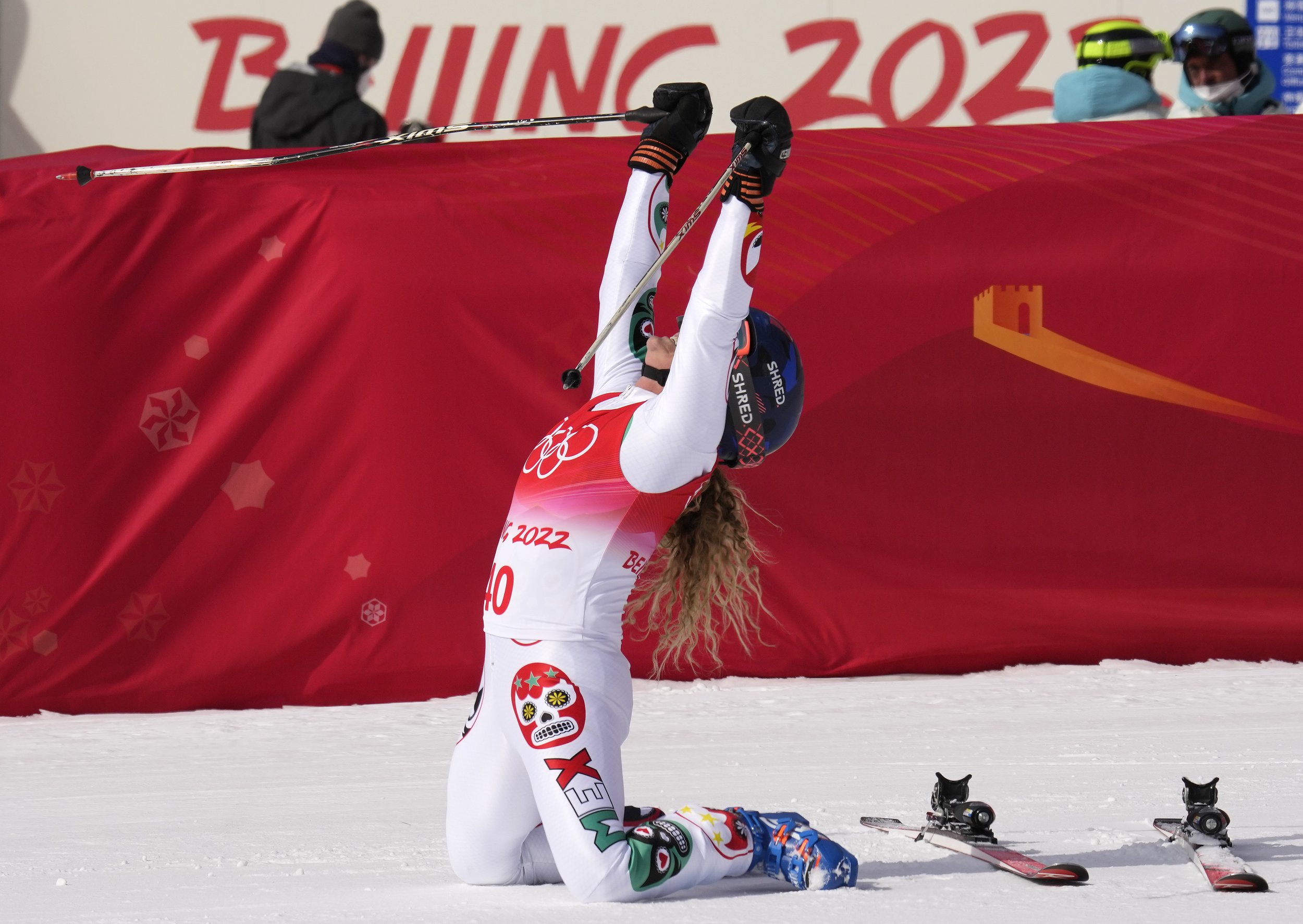  Sarah Schleper, of Mexico reacts after finishing the women's super-G at the 2022 Winter Olympics, Friday, Feb. 11, 2022, in the Yanqing district of Beijing. (AP Photo/Luca Bruno) 
