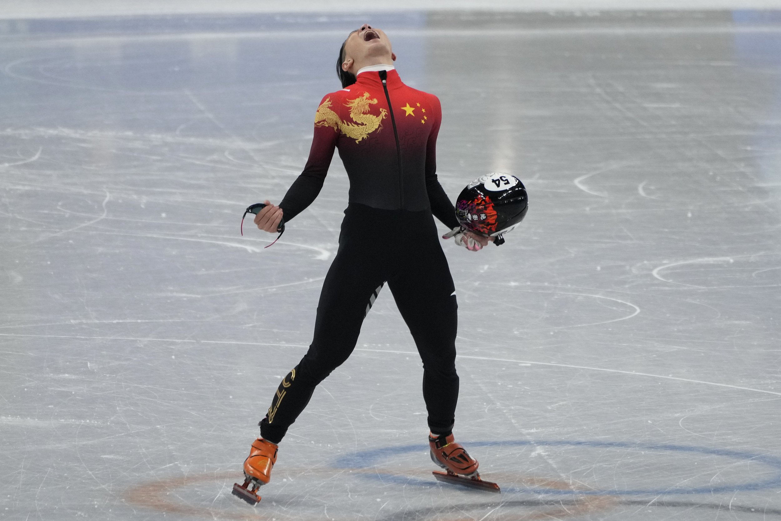  Ren Ziwei of China, reacts after winning the men's 1,000-meter final during the short track speedskating competition at the 2022 Winter Olympics, Monday, Feb. 7, 2022, in Beijing. (AP Photo/Natacha Pisarenko) 