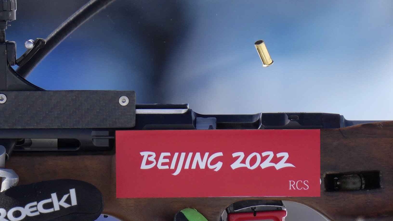  A shell casing is ejected during biathlon target shooting at the 2022 Winter Olympics, Friday, Feb. 4, 2022, in Zhangjiakou, China. (AP Photo/Kirsty Wigglesworth) 