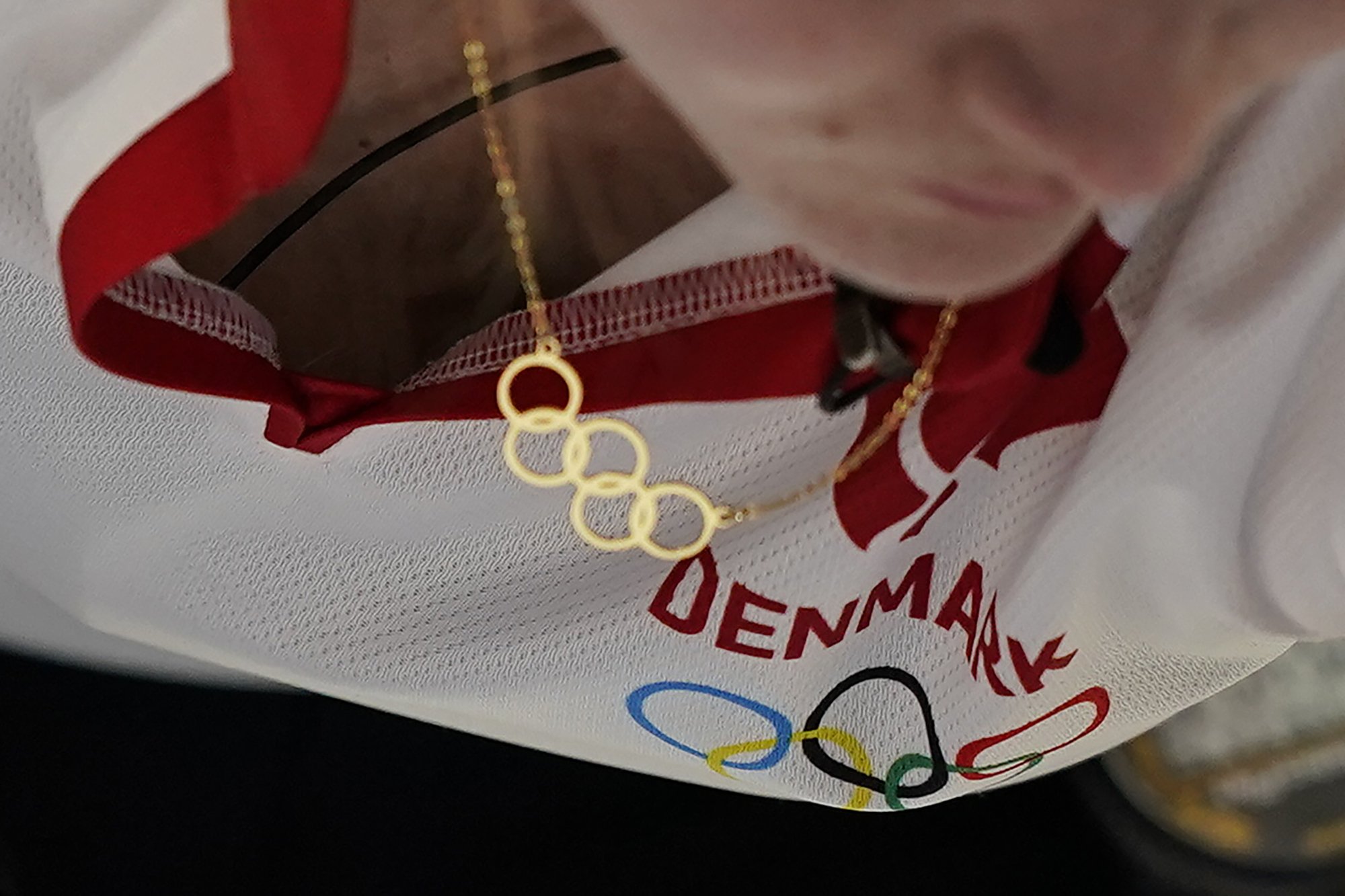  Denmark's Mathilde Halse wears the Olympics Rings necklace during a women's curling match against Japan at the Beijing Winter Olympics Saturday, Feb. 12, 2022, in Beijing. (AP Photo/Brynn Anderson) 