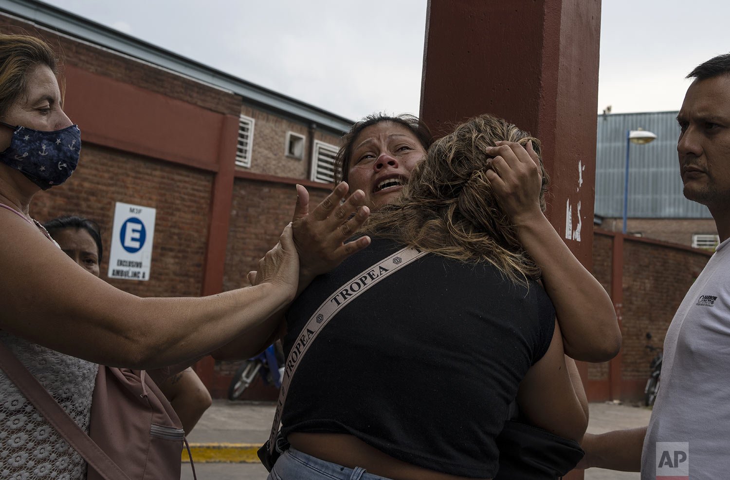  A woman grieves after learning her brother died from consuming toxic cocaine outside the Bocalandro Hospital  in Buenos Aires, Argentina, Feb. 4, 2022. A batch of cocaine that appears to have been laced with a synthetic opioid killed 24 people and h