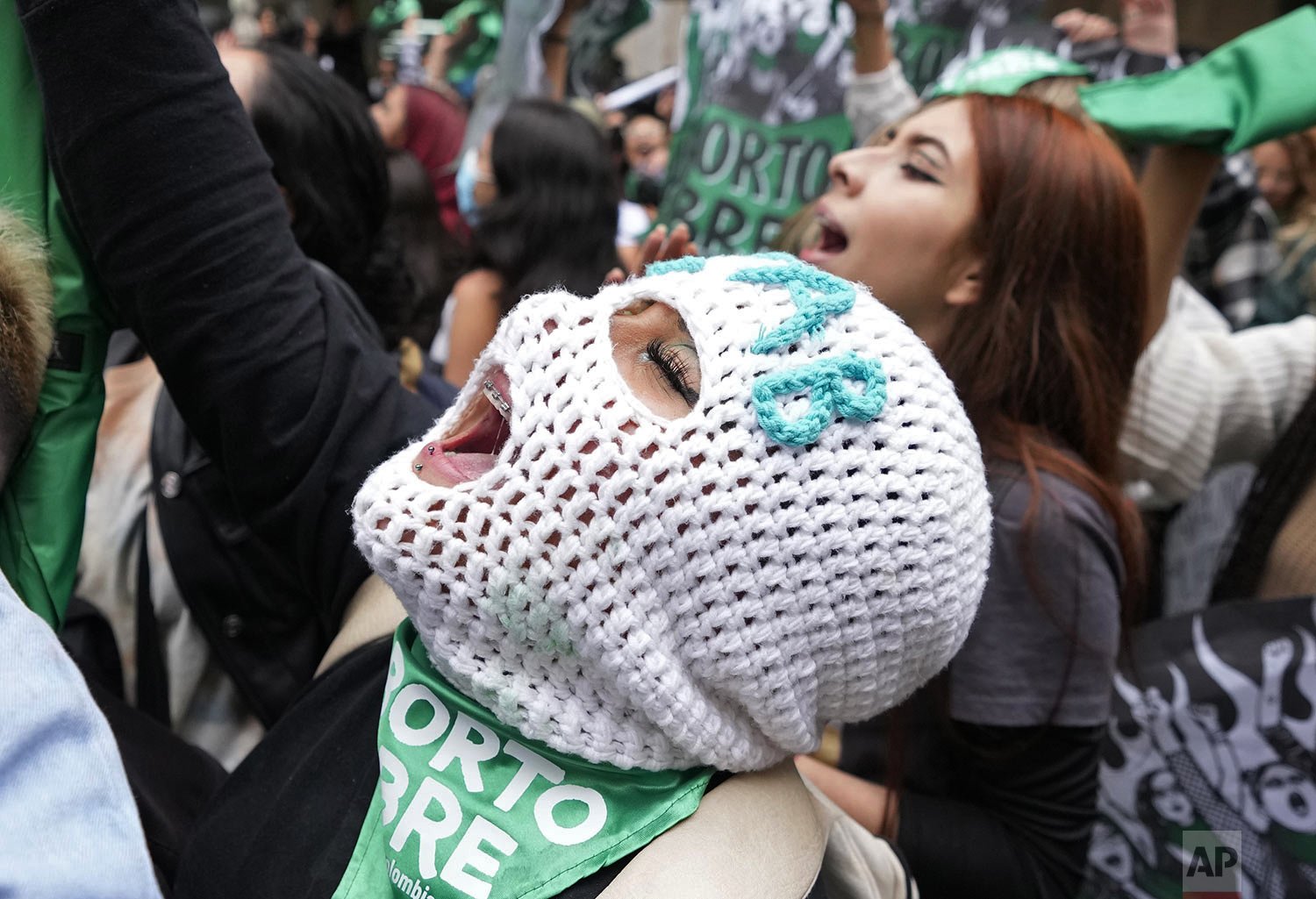  Abortion-rights activists celebrate after the Constitutional Court approved the decriminalization of abortion, lifting all limitations on the procedure until the 24th week of pregnancy, in Bogota, Colombia, Feb. 21, 2022. (AP Photo/Fernando Vergara)