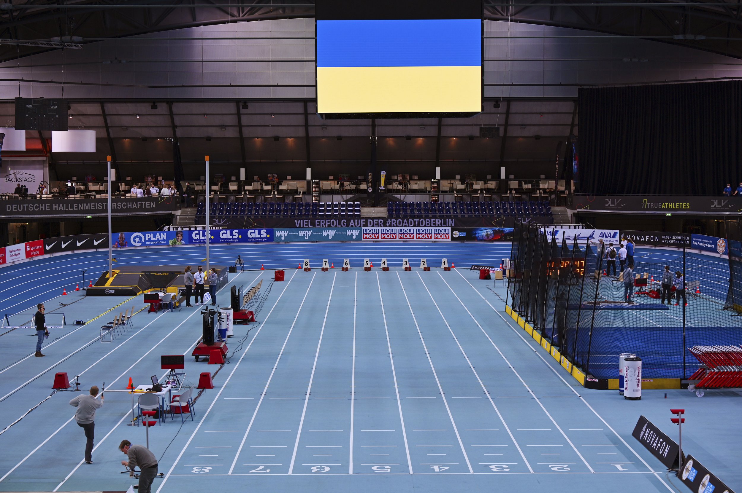  The colors of Ukraine are displayed on a video screen at the German Indoor Championships in Athletics in the Arena Leipzig, Germany, Feb. 26, 2022. (Martin Schutt/dpa via AP) 